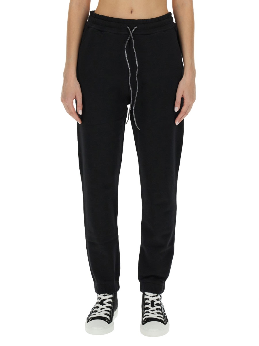 Shop Vivienne Westwood Jogging Pants With Spray Print Orb In Black