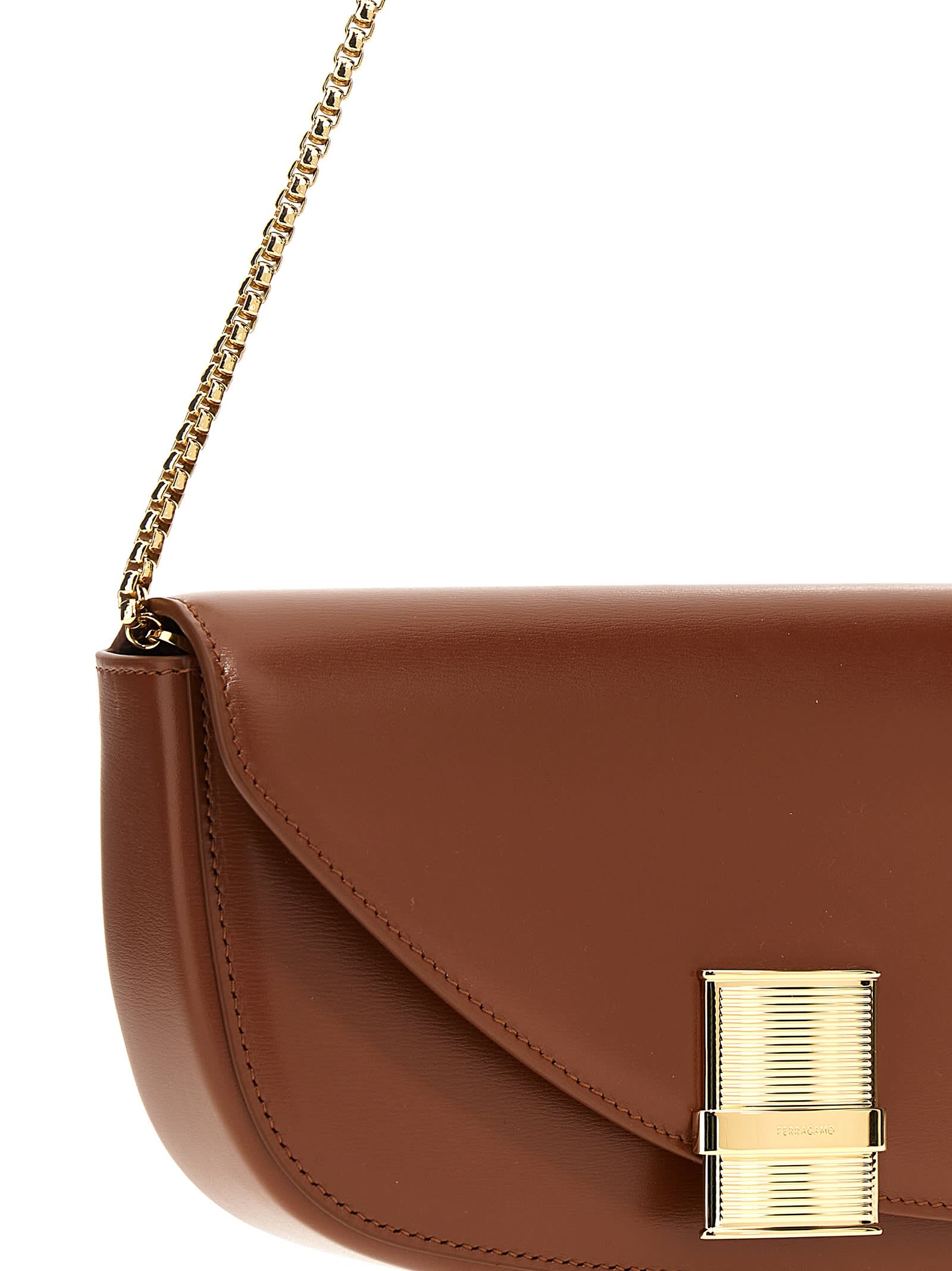 Shop Ferragamo Fiamma Xs Crossbody Bag In Brown