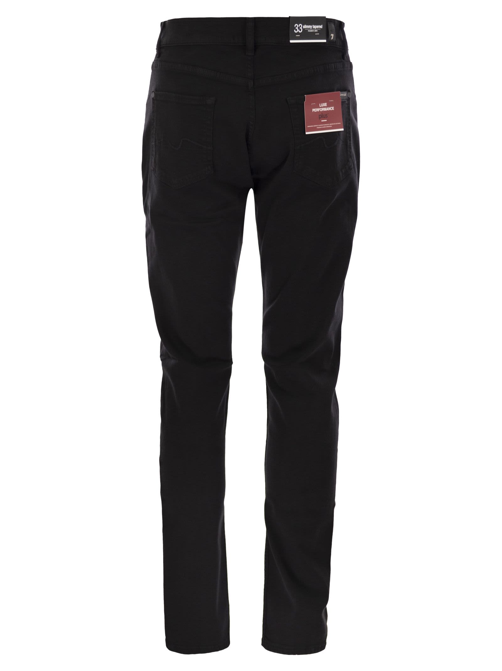 7 For All Mankind Slimmy Tapered Skinny Medium Waisted Jeans In Black