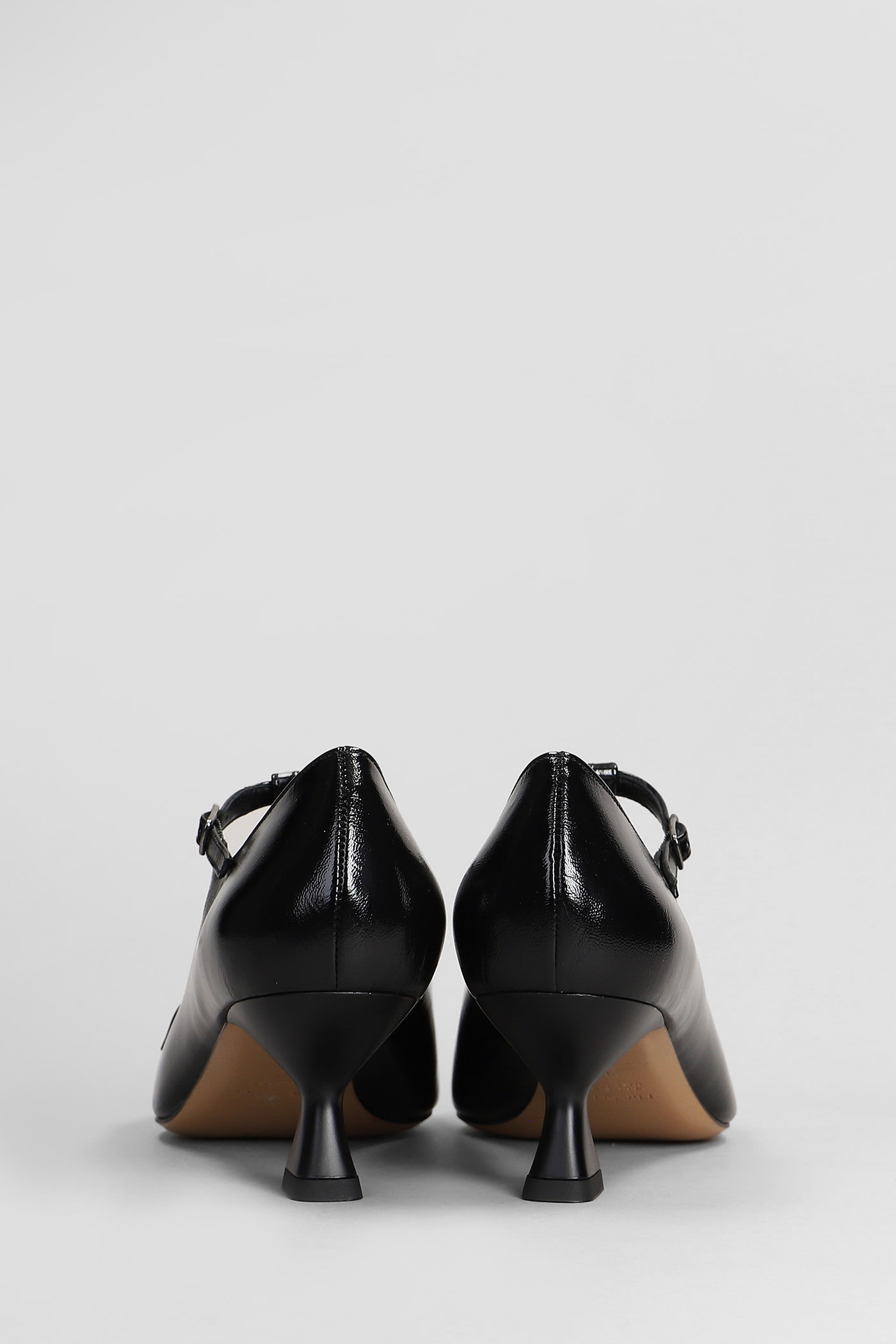 Shop The Seller Pumps In Black Patent Leather