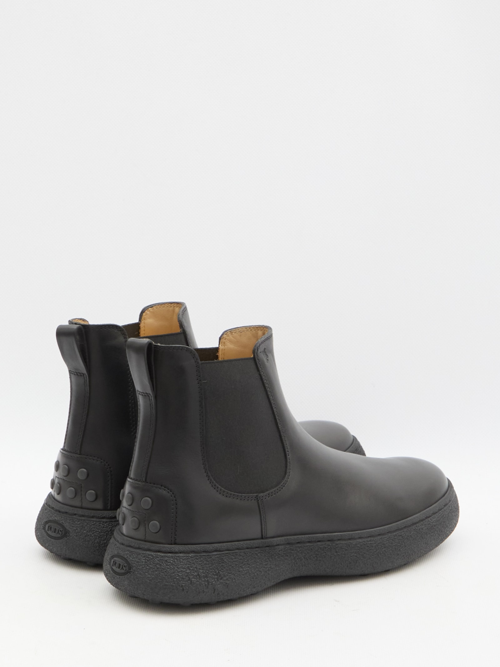 Shop Tod's Leather Chelsea Boots In Black