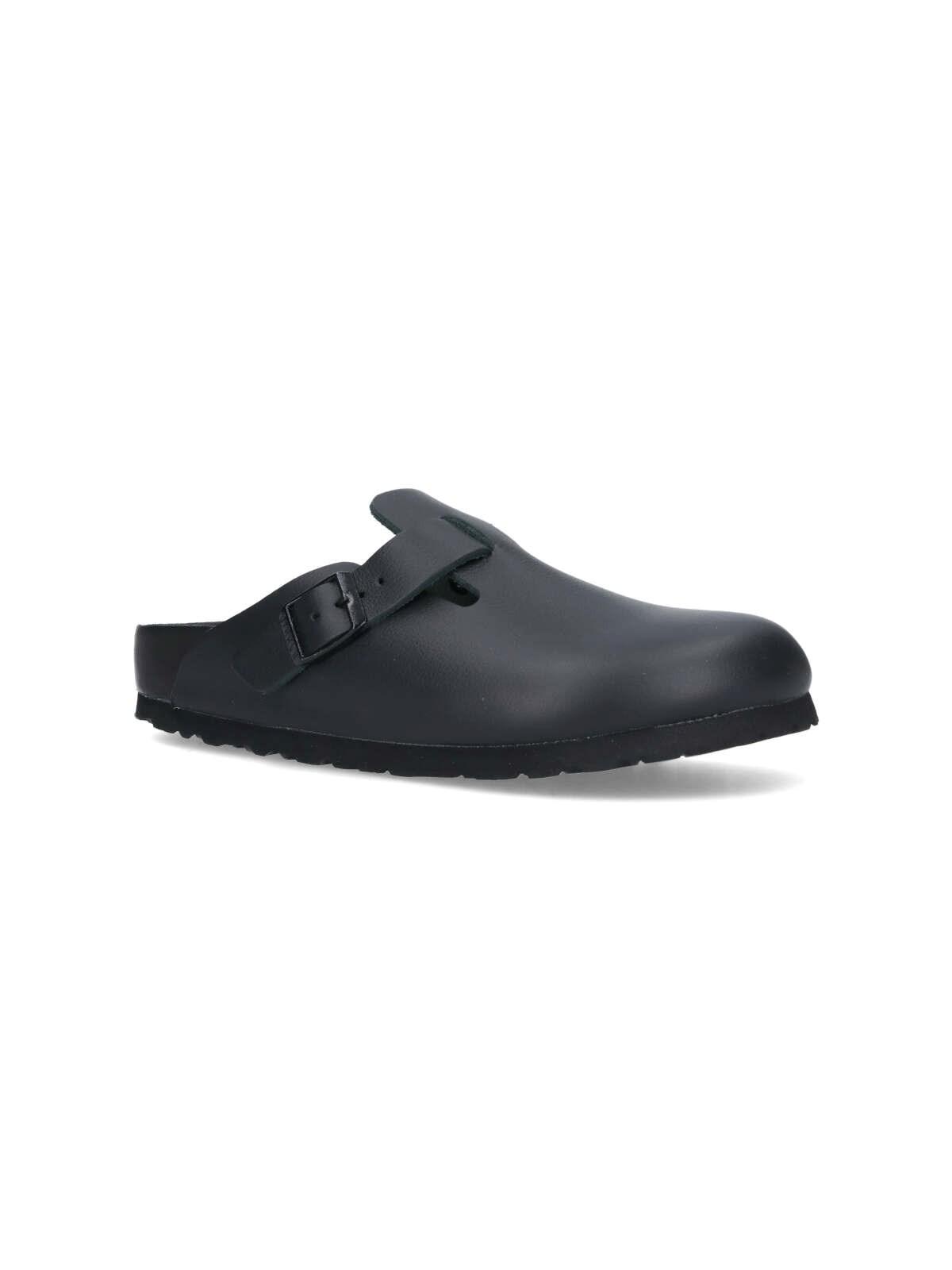 Shop Birkenstock Mules Boston In Black