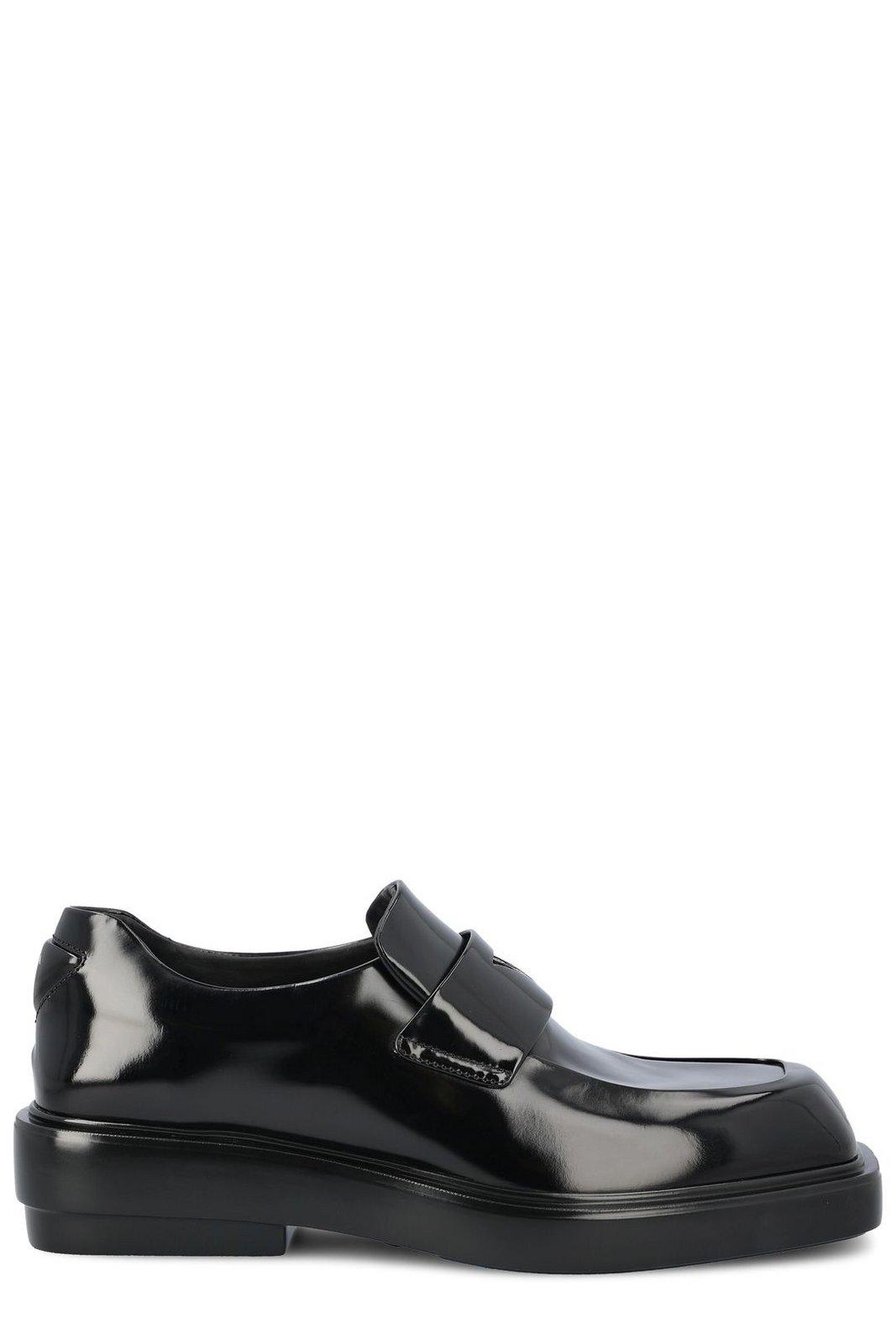 Shop Prada Triangle-patch Slip-on Loafers In Nero