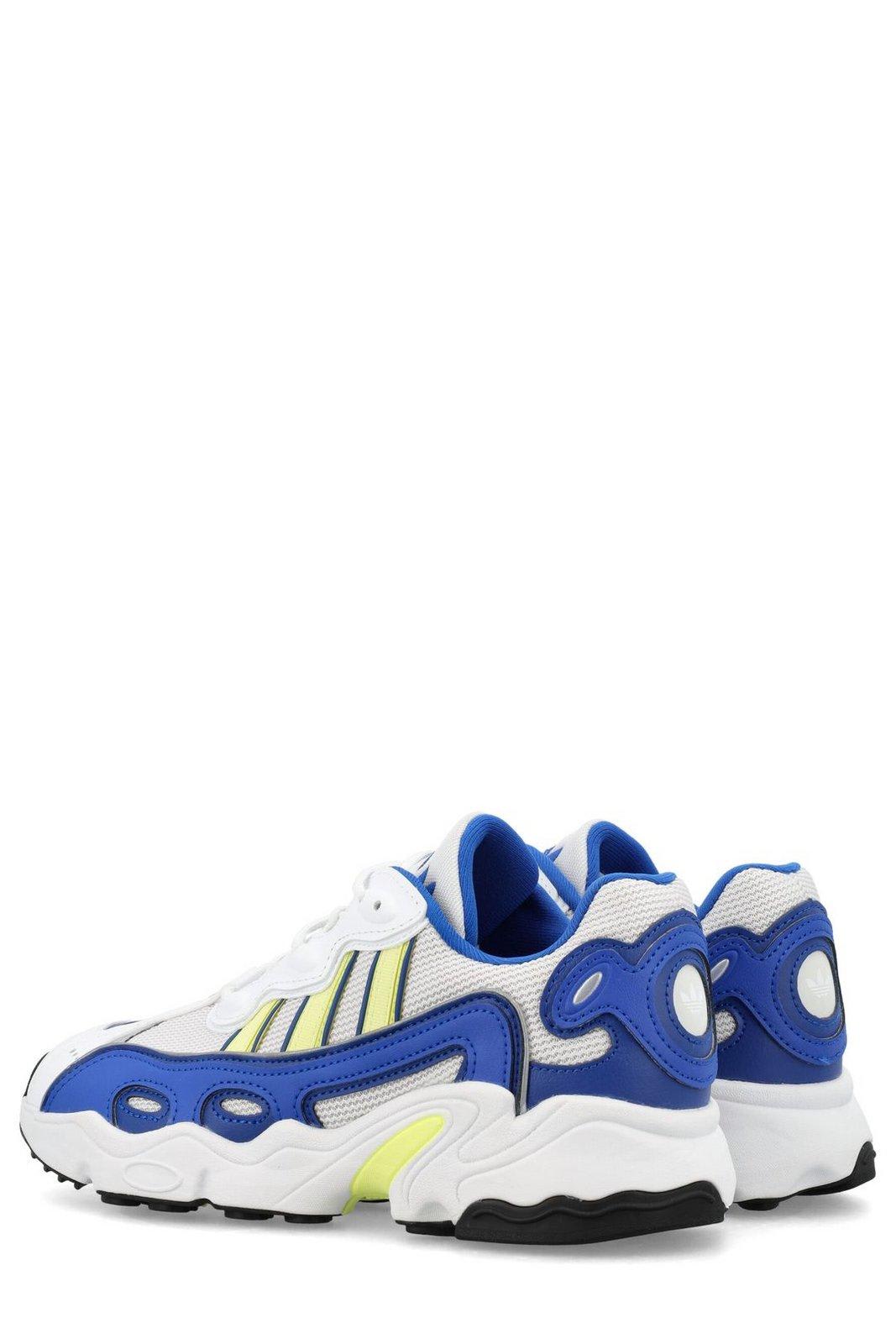 Shop Adidas Originals Ozweego Lace-up Sneakers In Ftwwht/pulyel/royblu