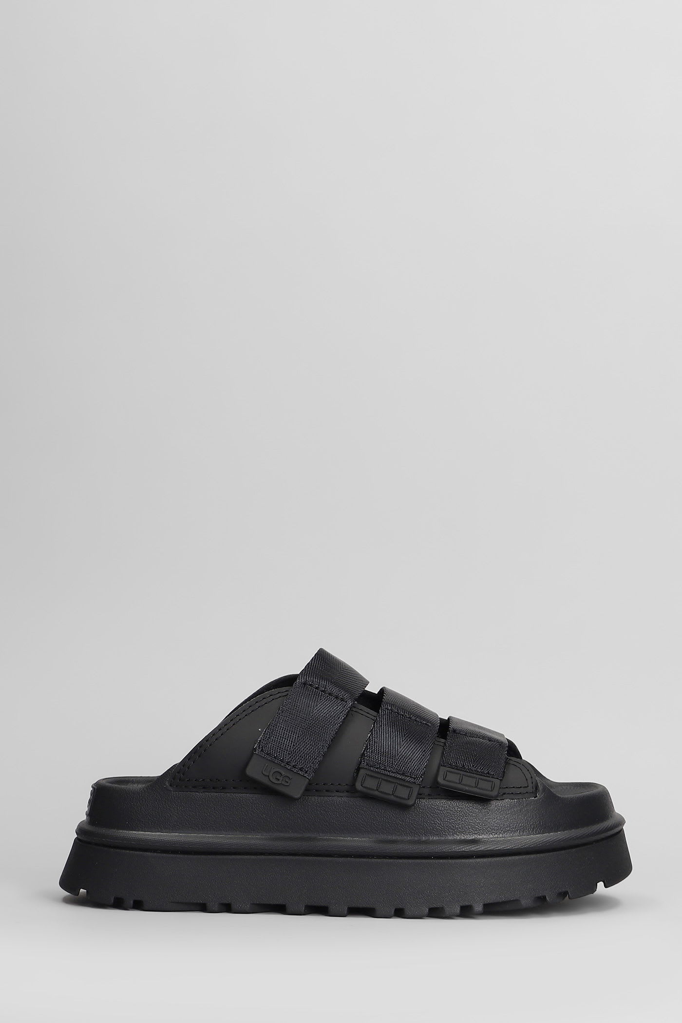 UGG GOLDENGLOW SLIPPER-MULE IN BLACK RUBBER/PLASIC