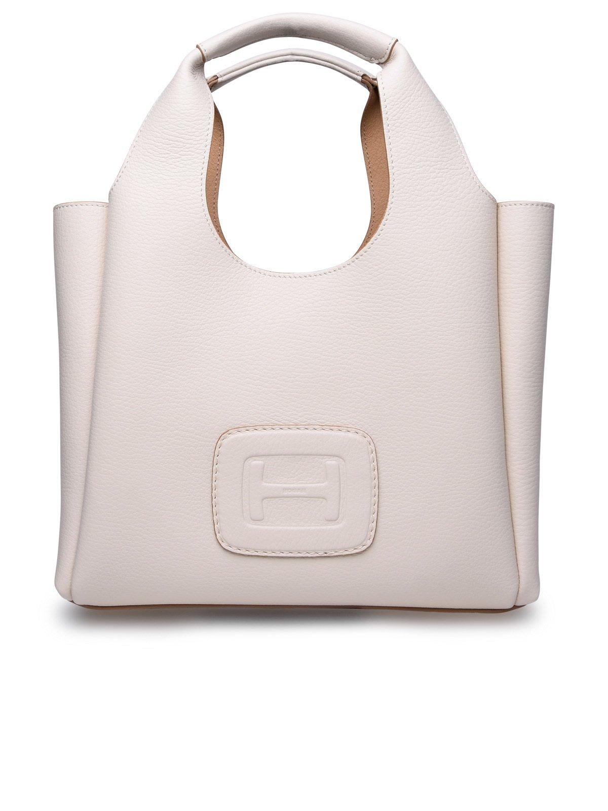 Shop Hogan Logo Embossed Medium Top Handle Bag In Neutrals