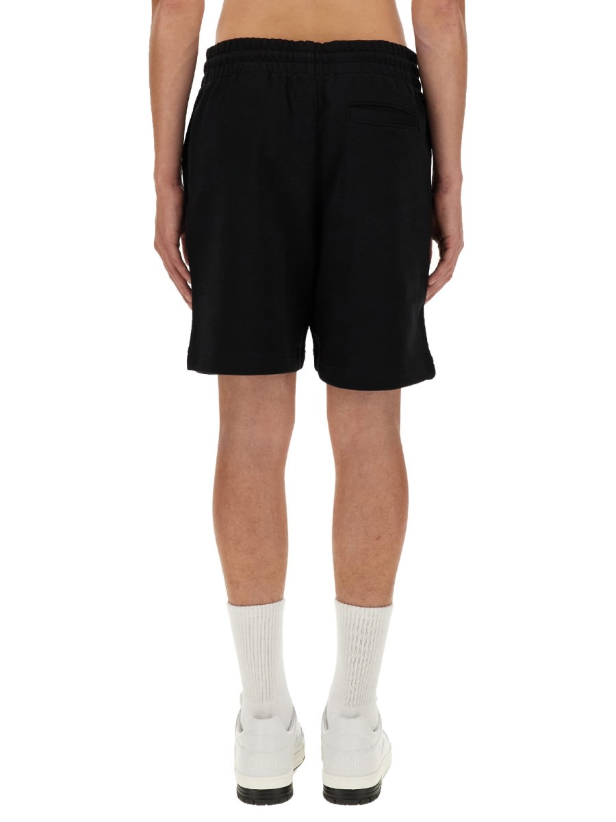 Shop Moschino Cotton Bermuda Shorts In Black