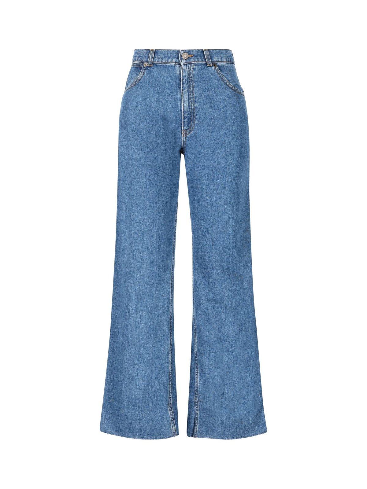 Shop Gucci Logo Patch Flared Jeans In Blue