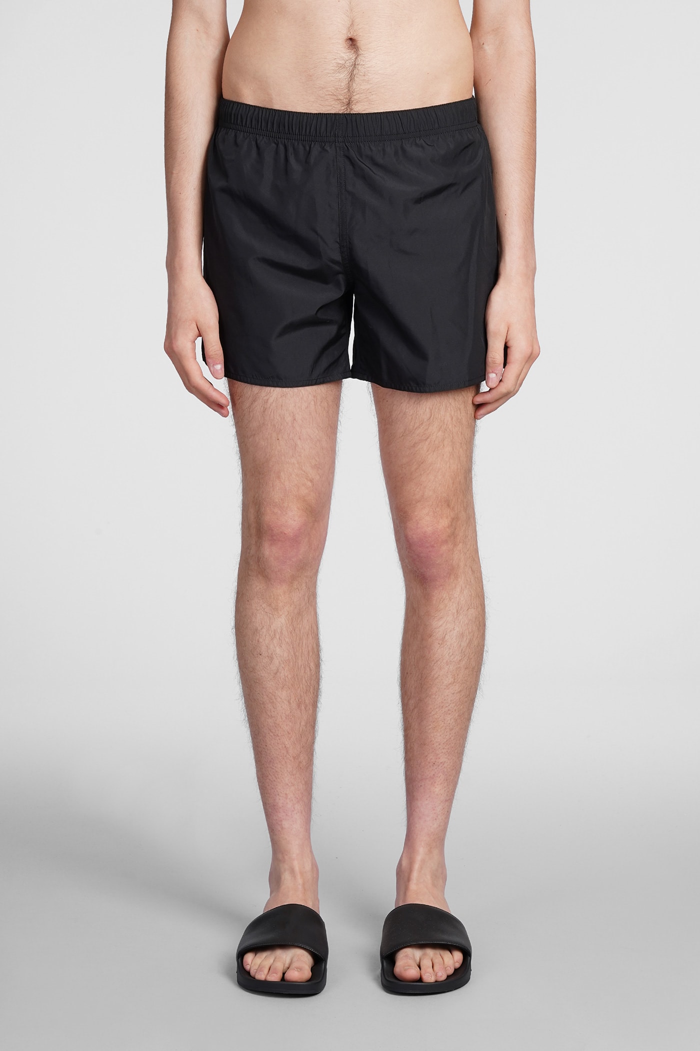 Courrèges Logo-patch Plain Swim Shorts In Black