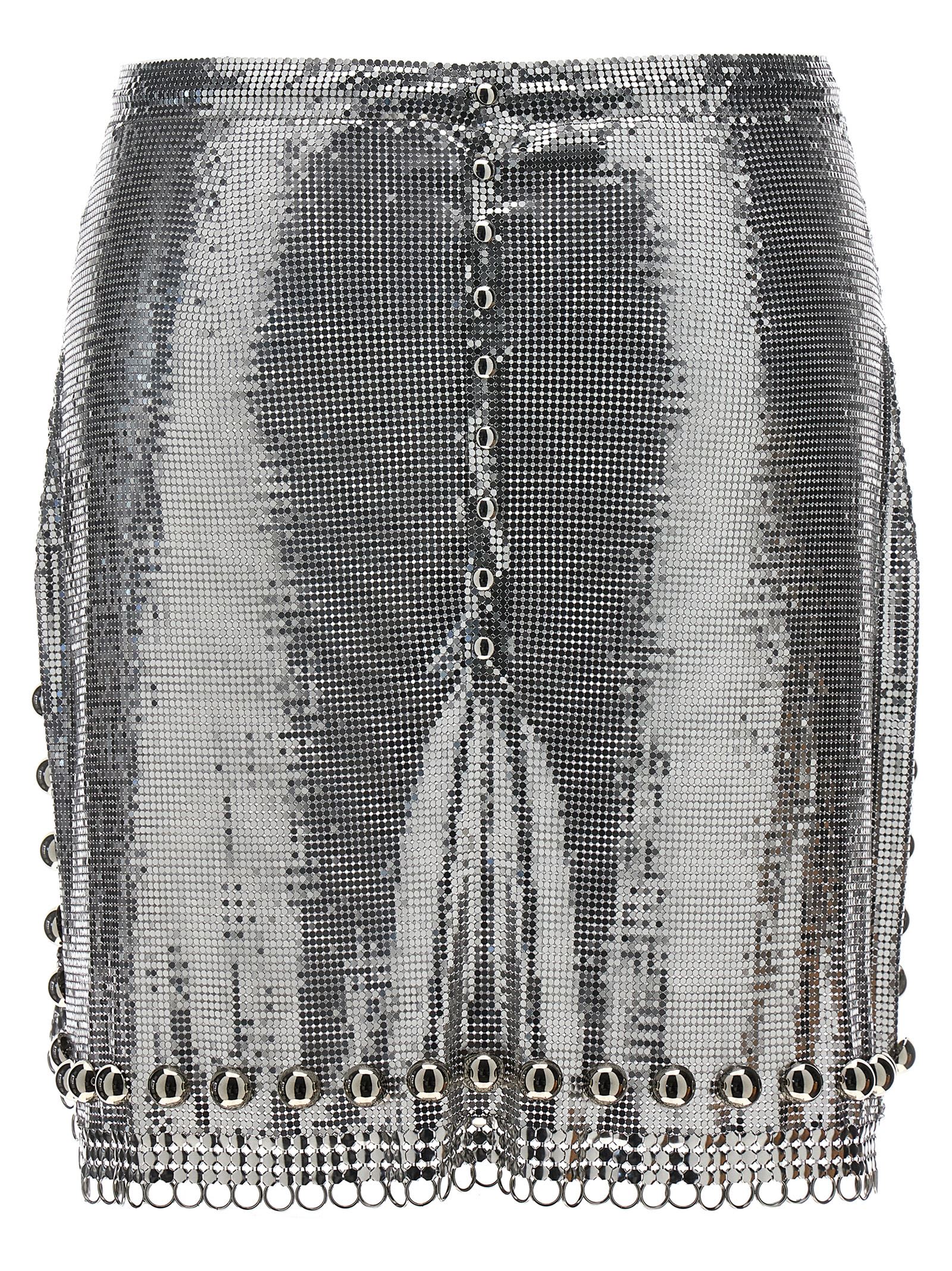 RABANNE SILVER MESH SHORT SKIRT WITH RINGS AND STUDS 