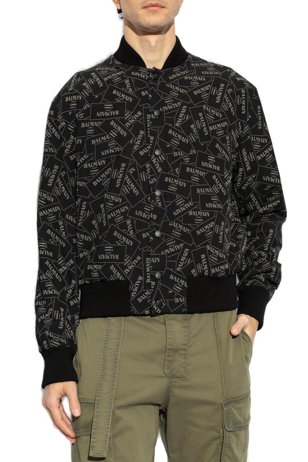 Shop Balmain Printed Logo Label Bomber Jacket In Black