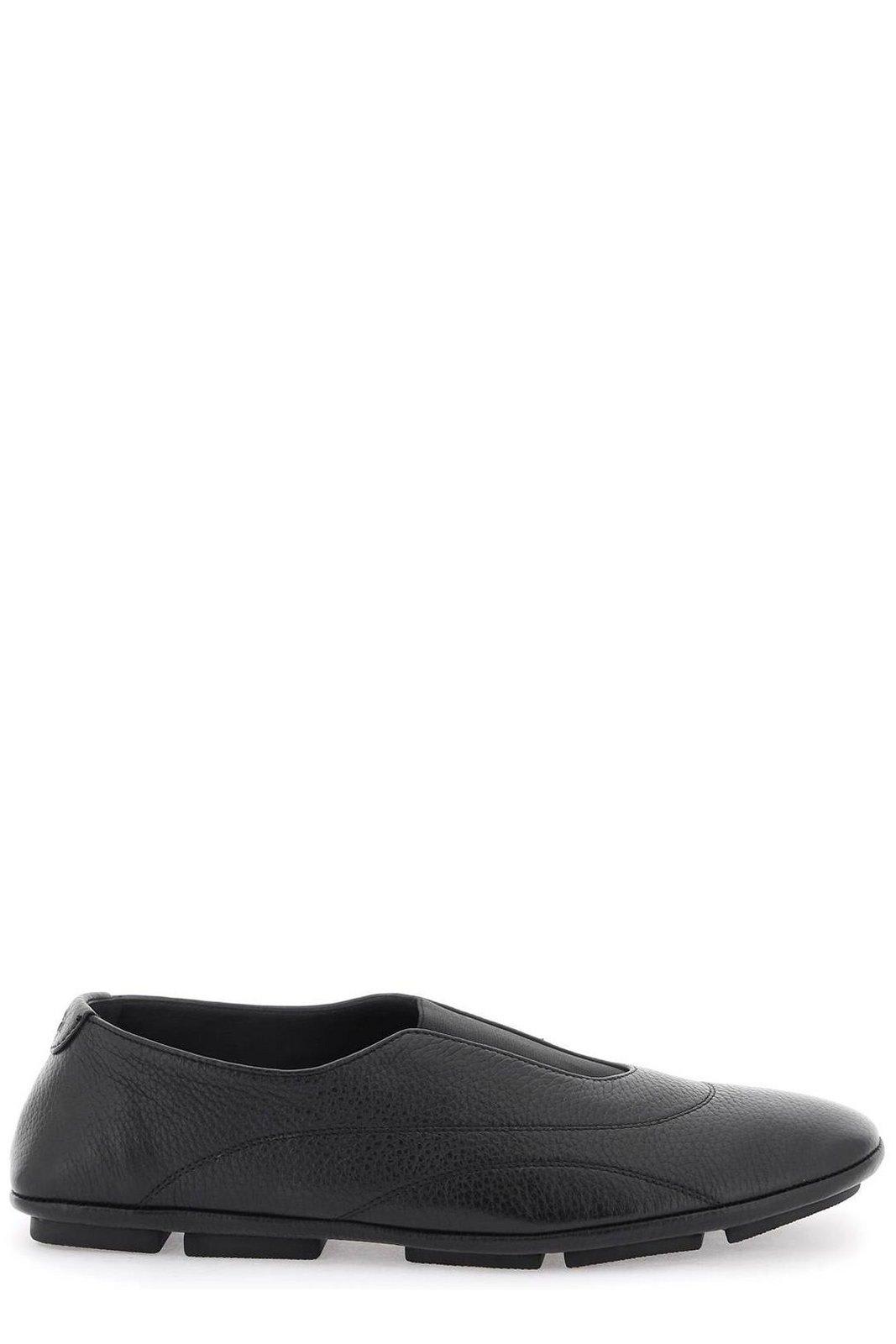 Shop Dolce & Gabbana Logo Embossed Loafers In Nero (black)