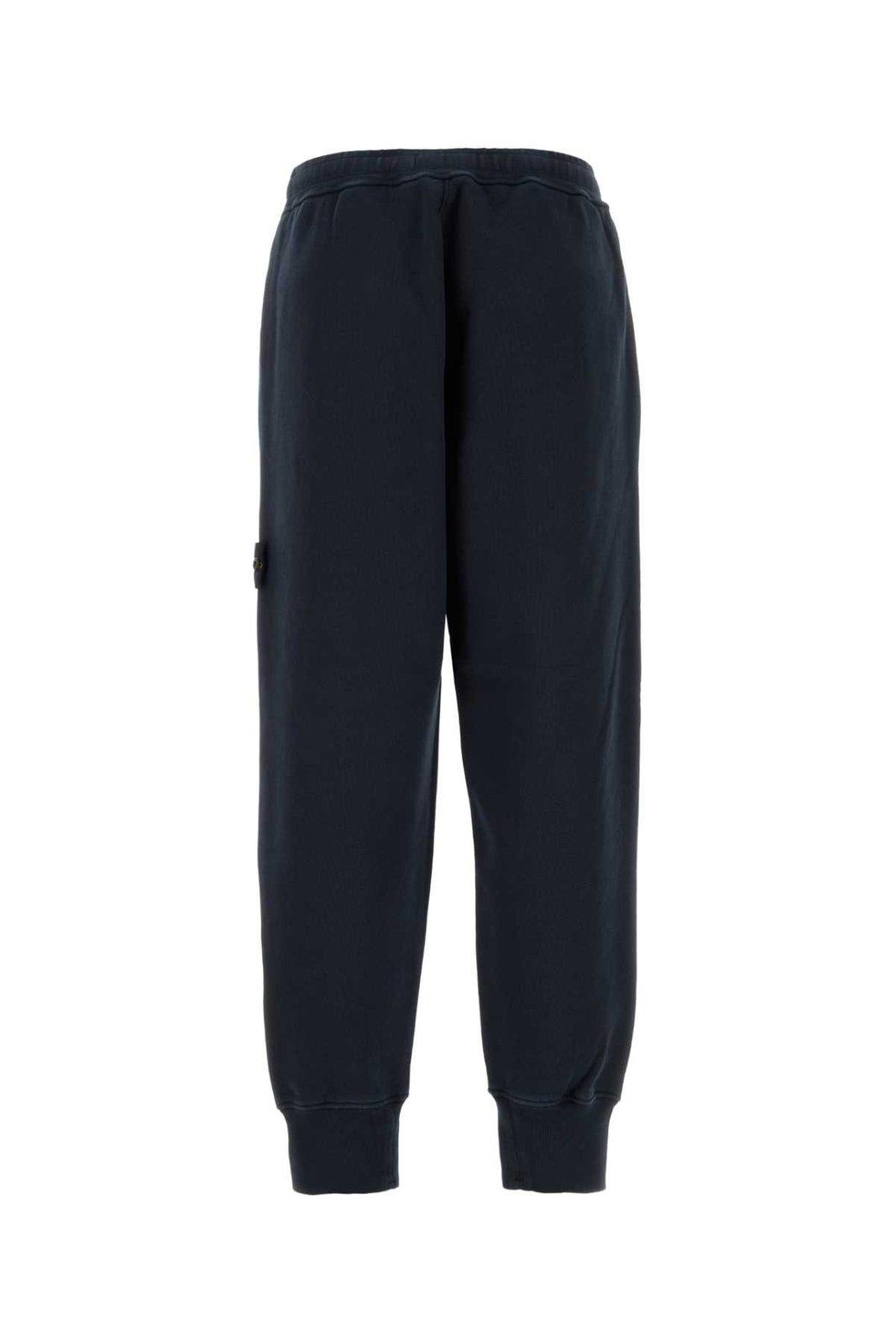 Shop Stone Island Logo Patch Track Pants In Blue