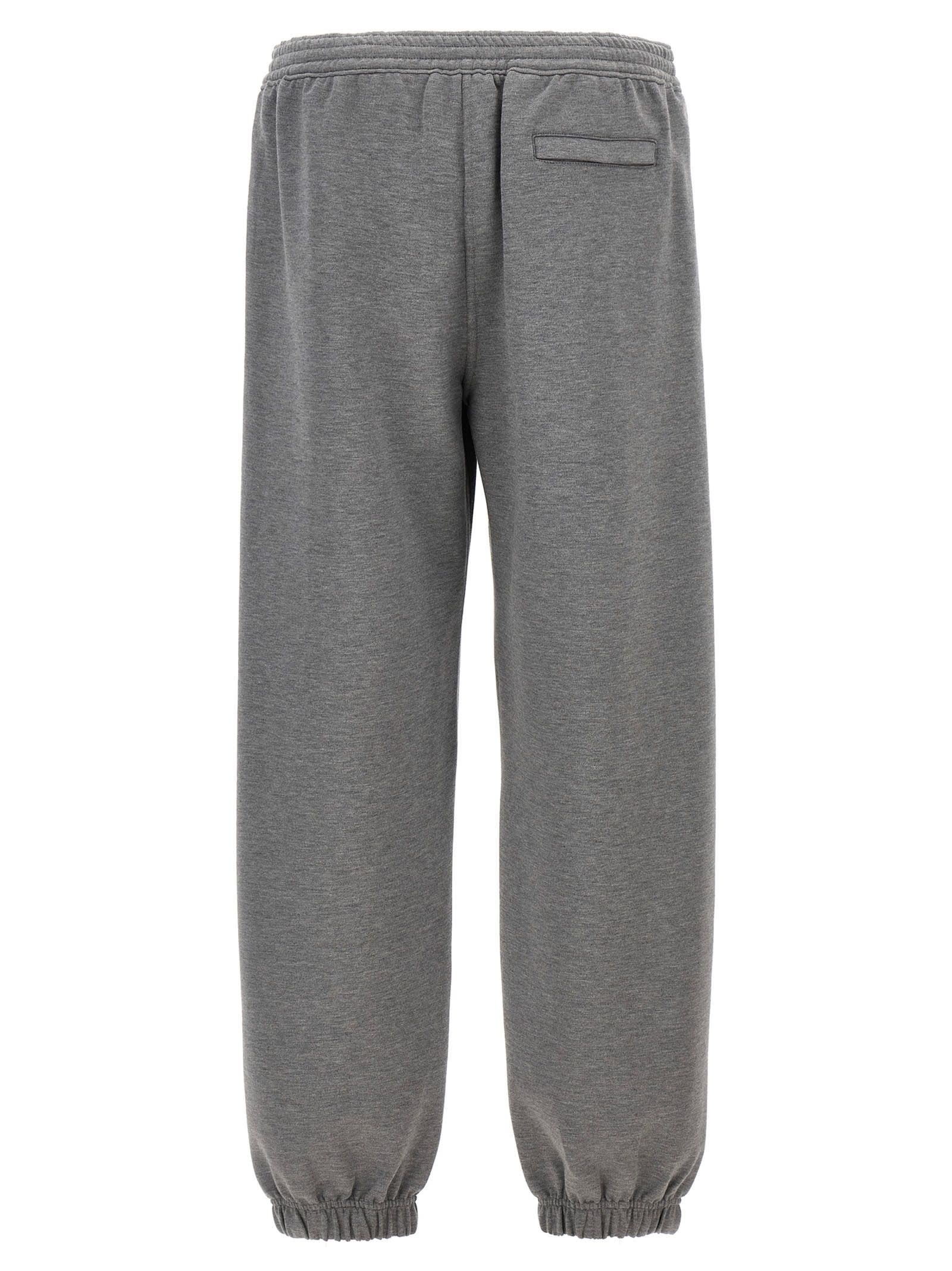 Shop Givenchy Metallic Logo Joggers In Gray