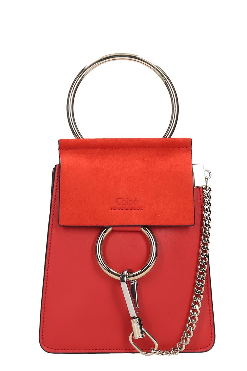 red suede shoulder bag