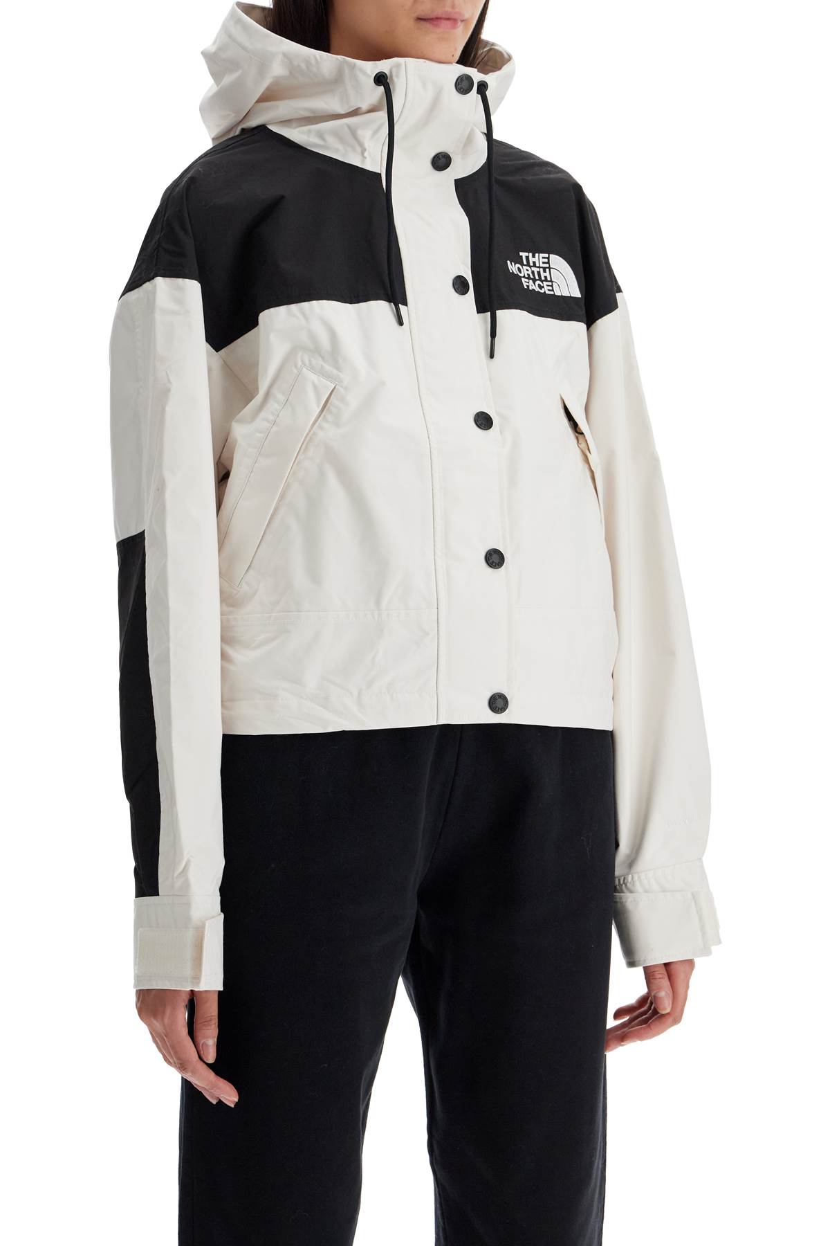 Shop The North Face Reign On Windbreaker Jacket In White Dune/tnf Black (white)