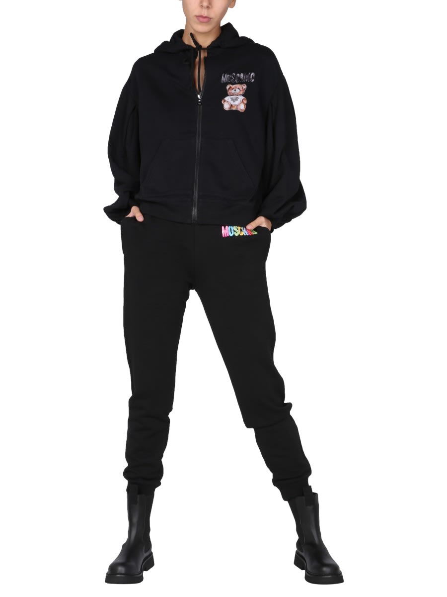 Shop Moschino Jogging Pants With Logo Print In Black