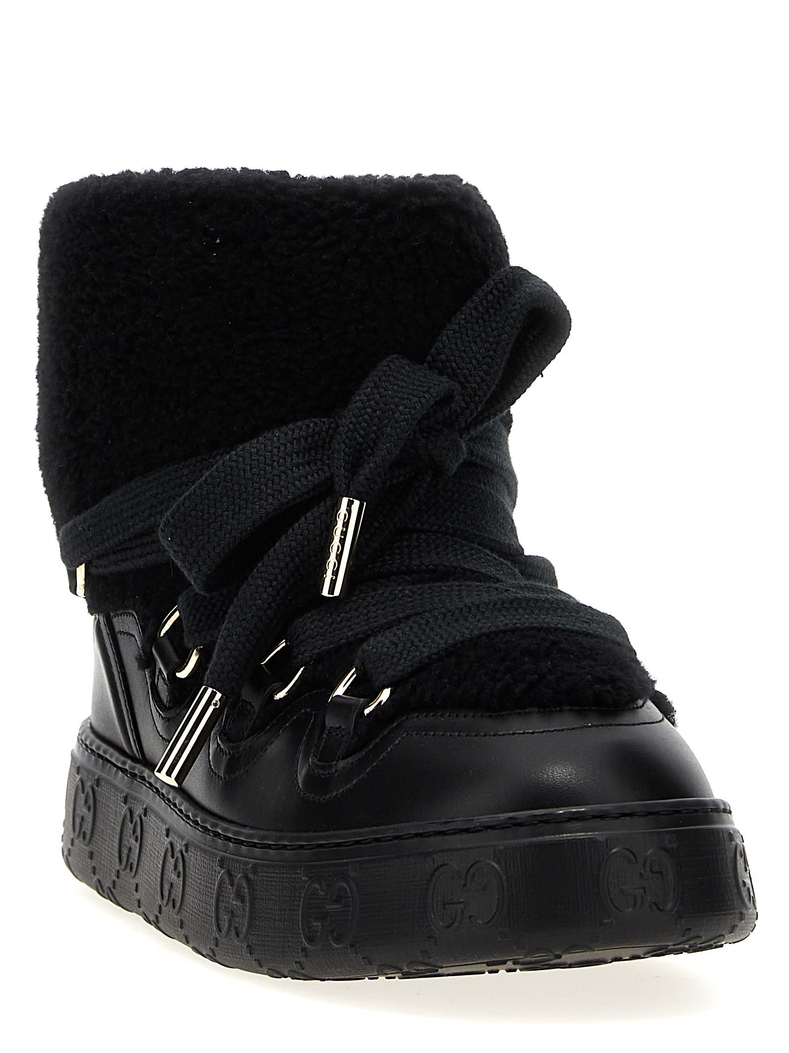 Gucci Shearling Trim Ankle Boots With Metal Eyelets In Black