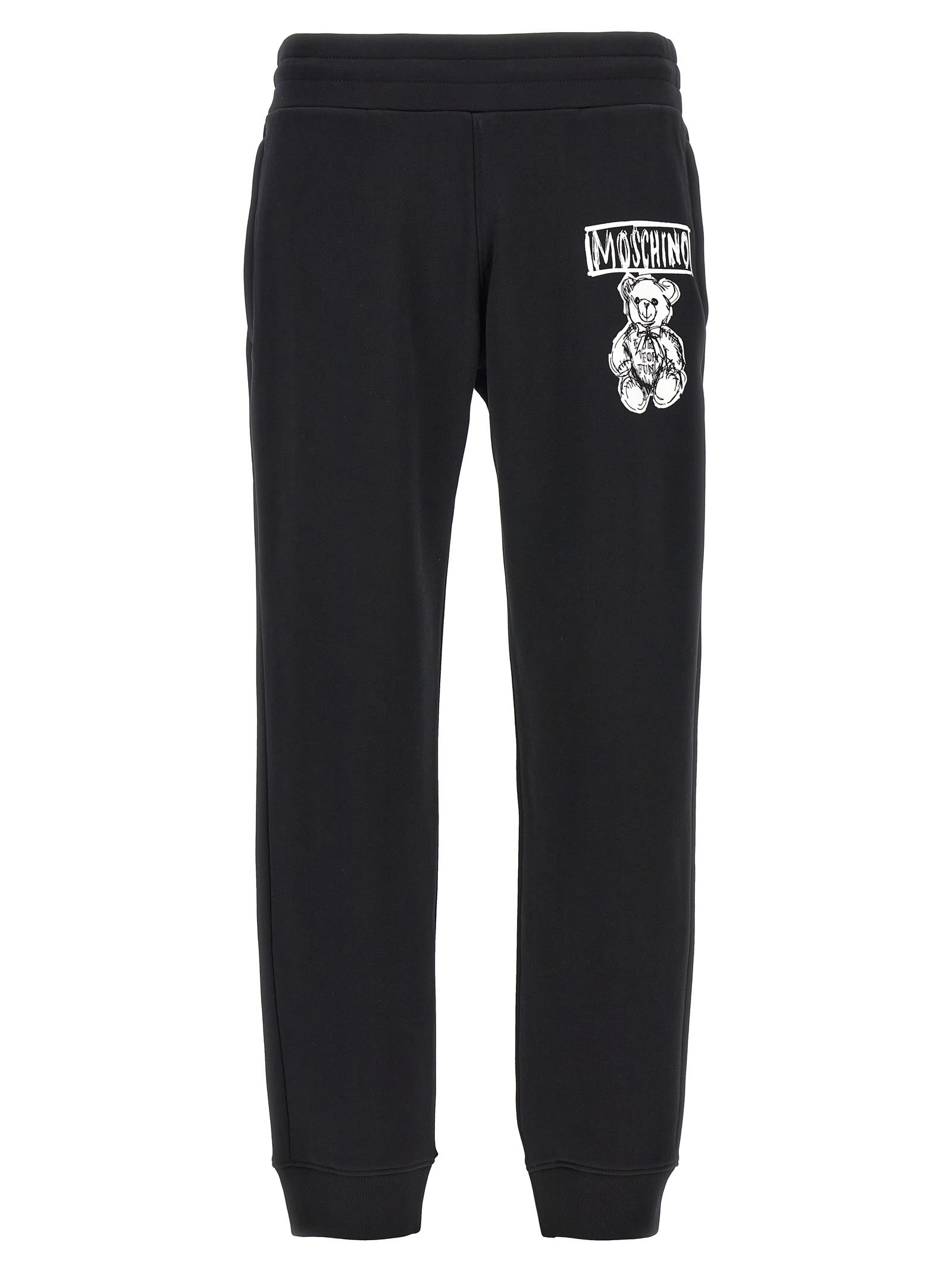 Shop Moschino Logo Print Joggers In White/black