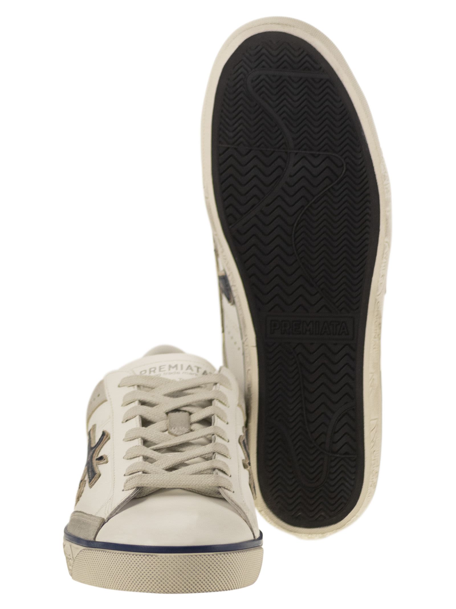 Premiata Steven Sneakers In White/blue