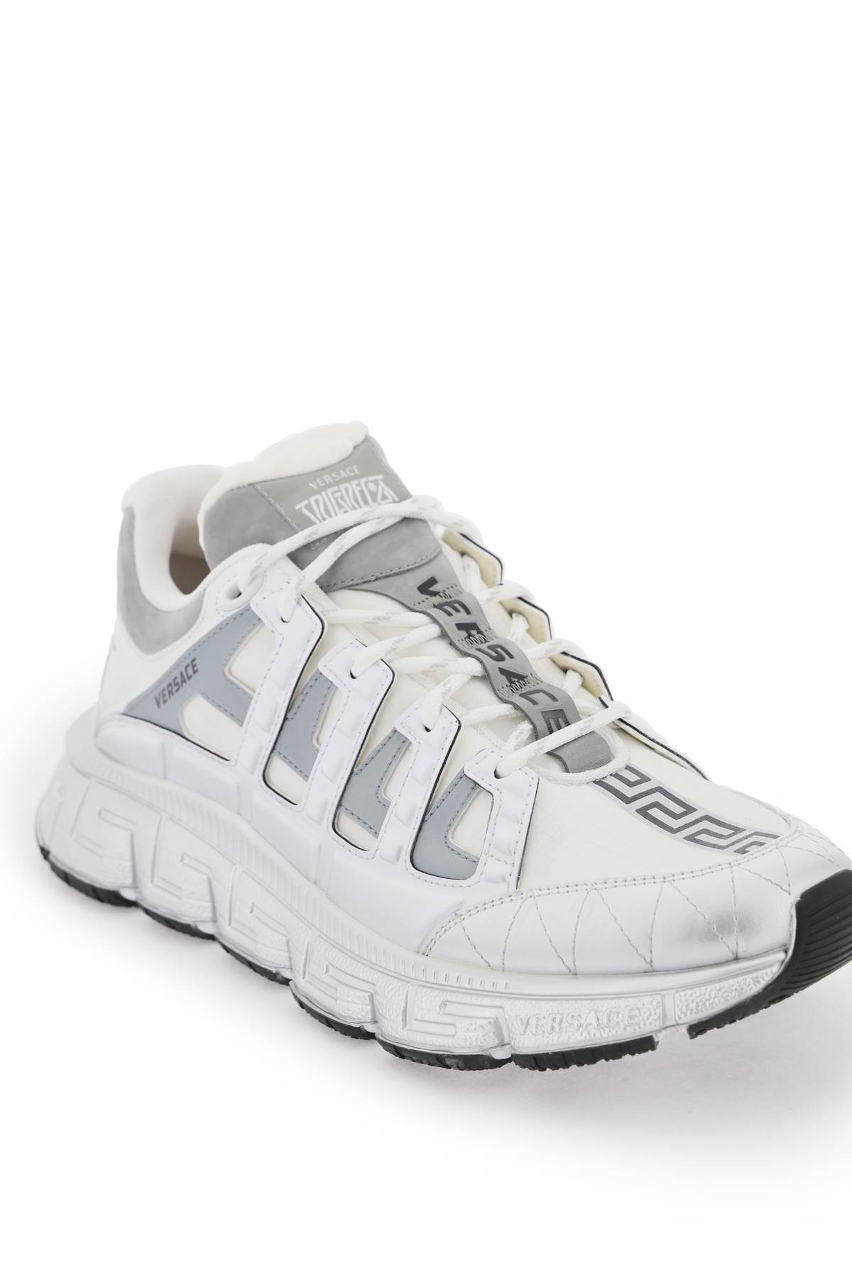 Shop Versace Trigreca Sneakers In White Silver (silver)