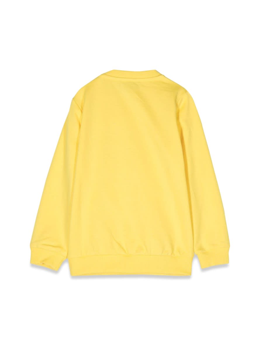 Shop Moschino Sweatshirt In Yellow