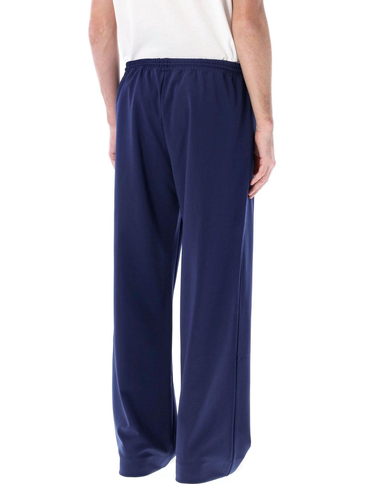 Shop Jw Anderson Drawstring Track Pants In Blue