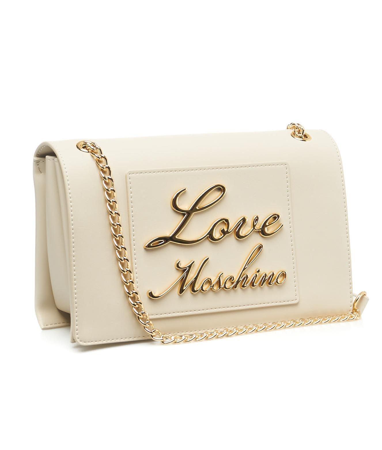 Shop Moschino Logo Lettering Chain Linked Shoulder Bag In Avorio
