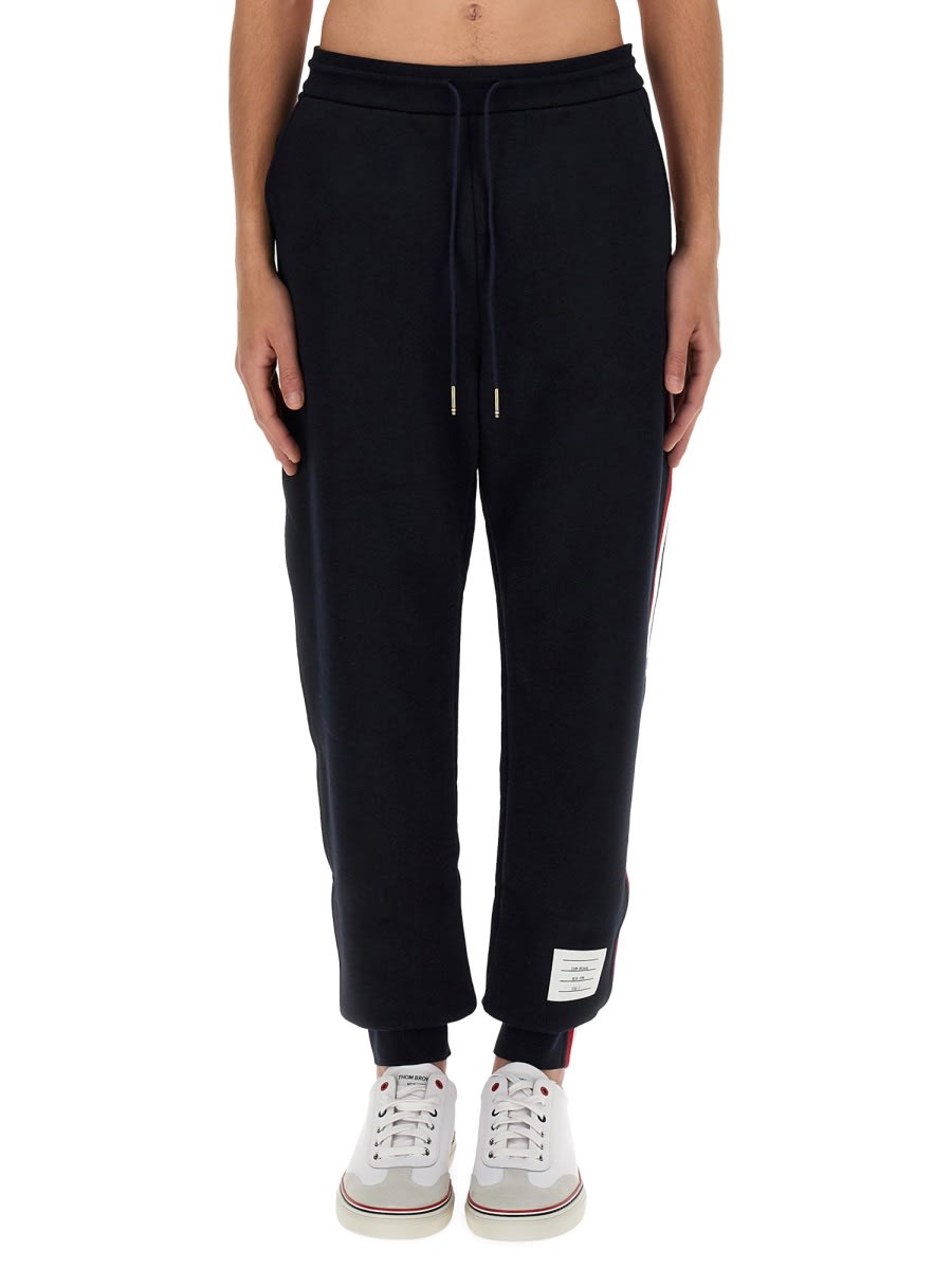 Shop Thom Browne Jogging Pants With Rwb Stripe In Blue