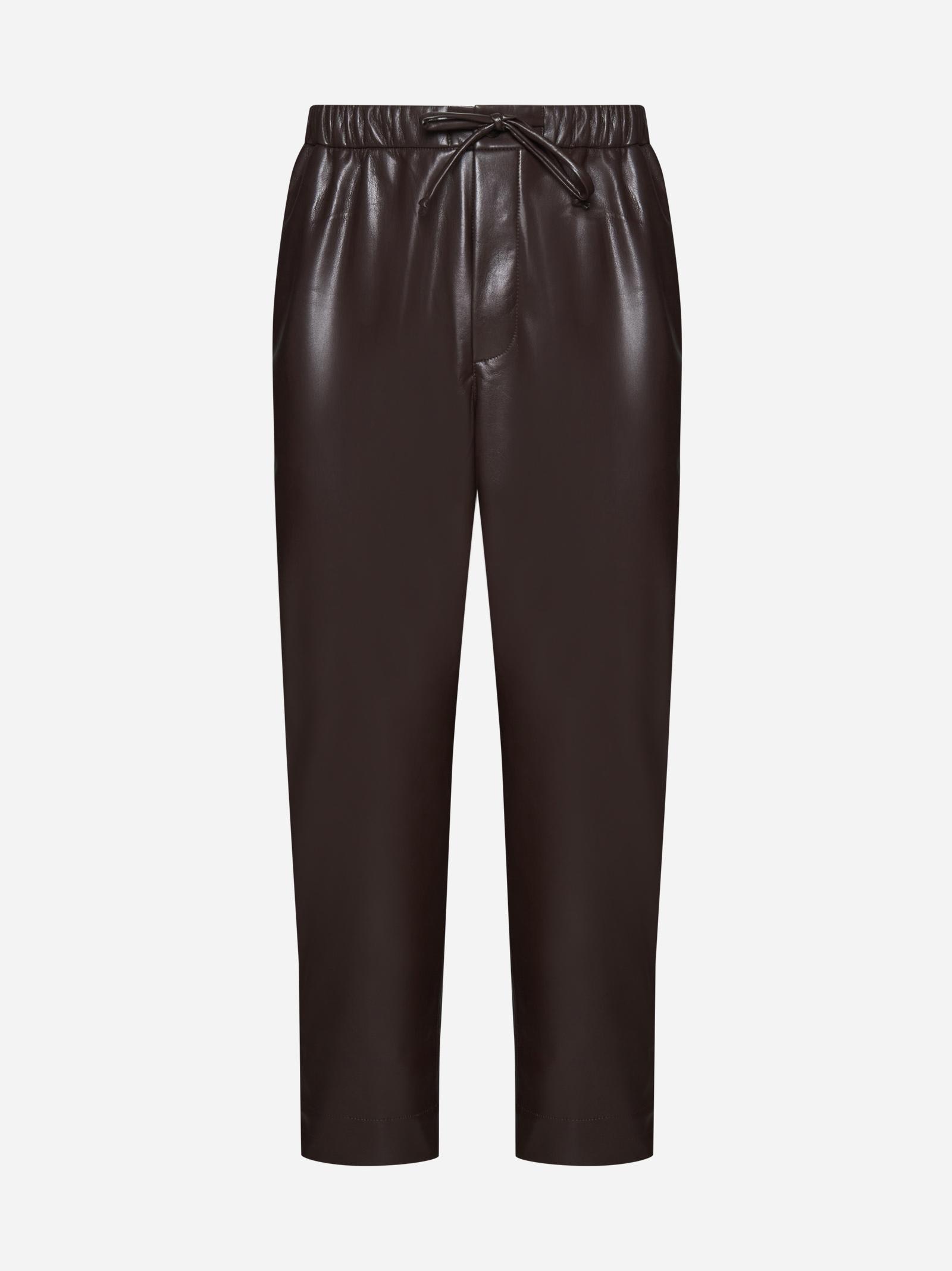 Shop Nanushka Jain Vegan Leather Trousers In Brown