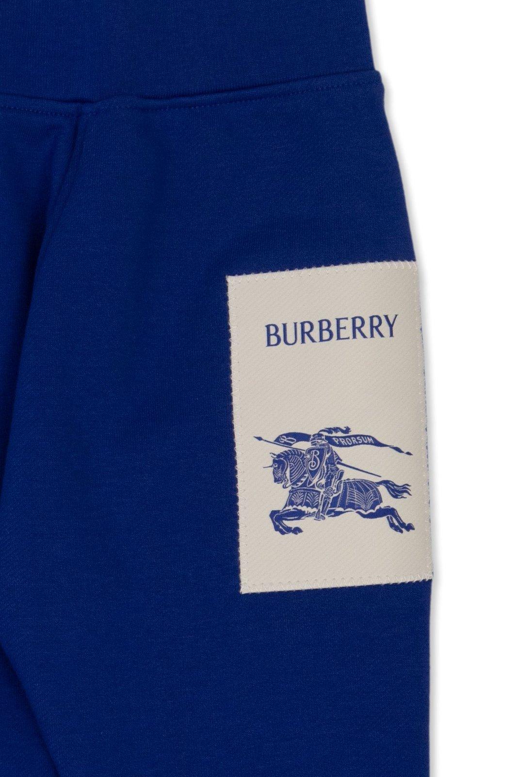 Shop Burberry Equestrian Knight Motif Track Pants In Blu