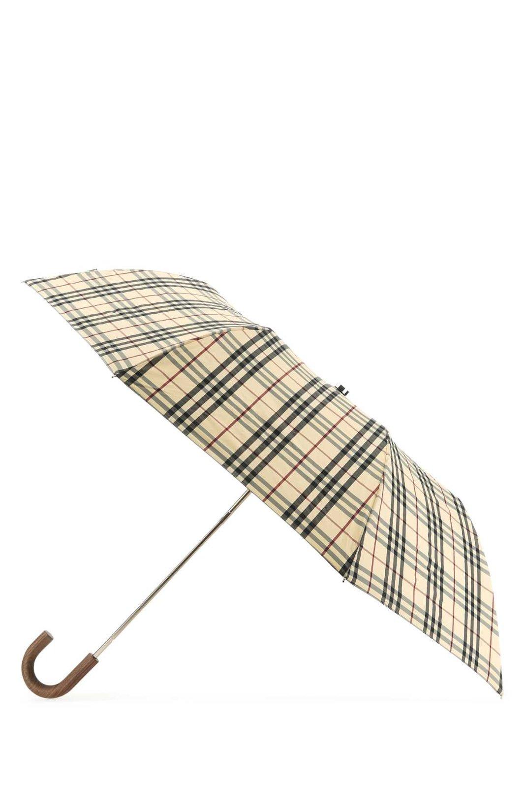 Shop Burberry Vintage-check Folding Waterproof Umbrella In Neutrals