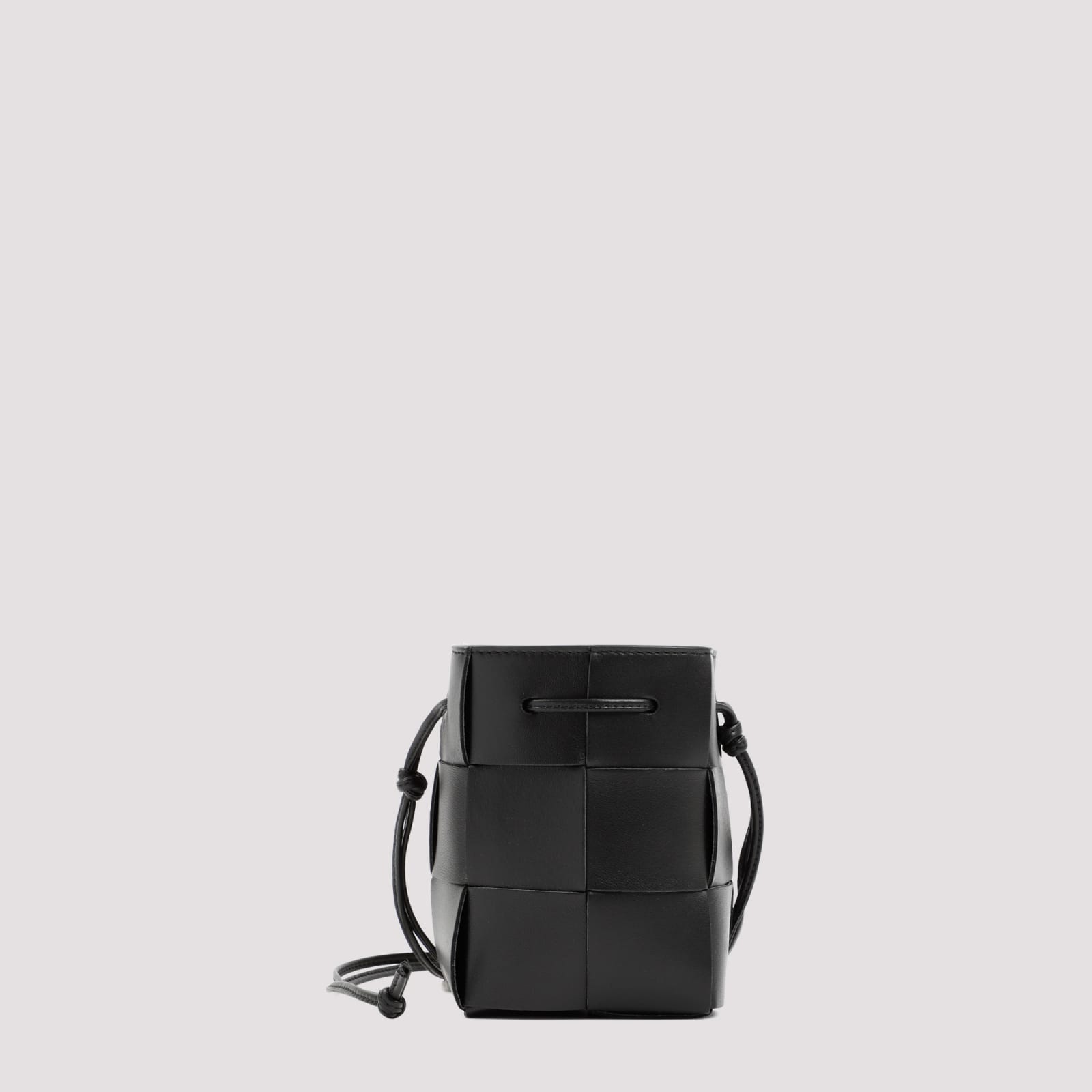 Shop Bottega Veneta Cassette Mini Leather Bucket Bag In Black Gold