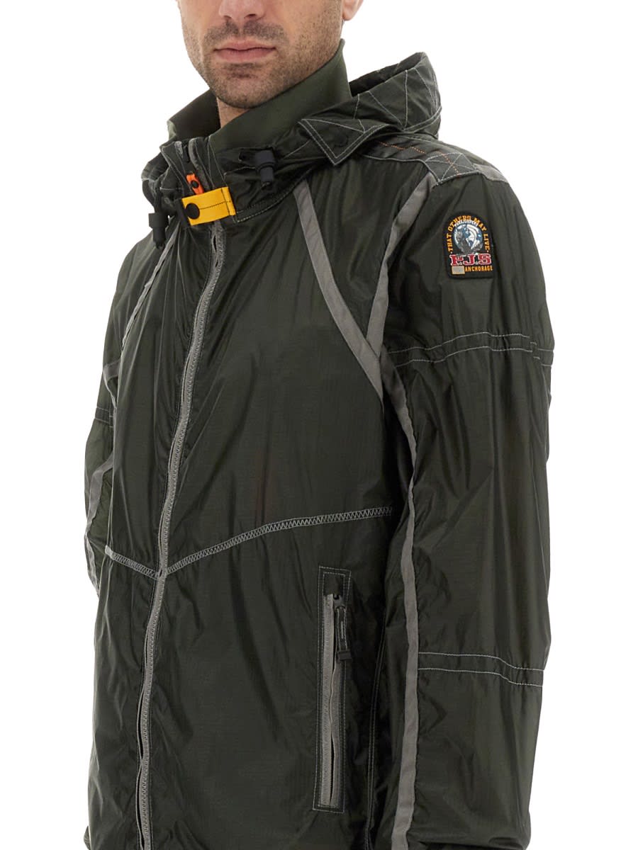 Parajumpers Edge Green Jacket With Logo Patch On The Sleeve And Shoulder Straps On The Back In Tech Fabric Man In Military Green
