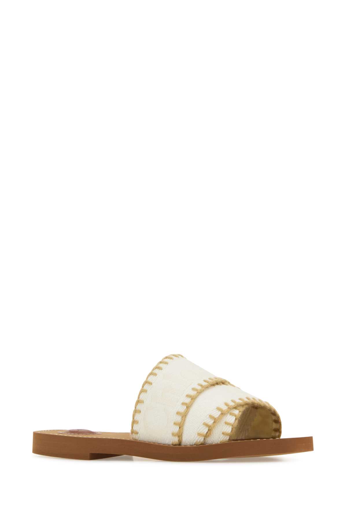 Shop Chloé Ivory Canvas Woody Slippers In Vanillaice
