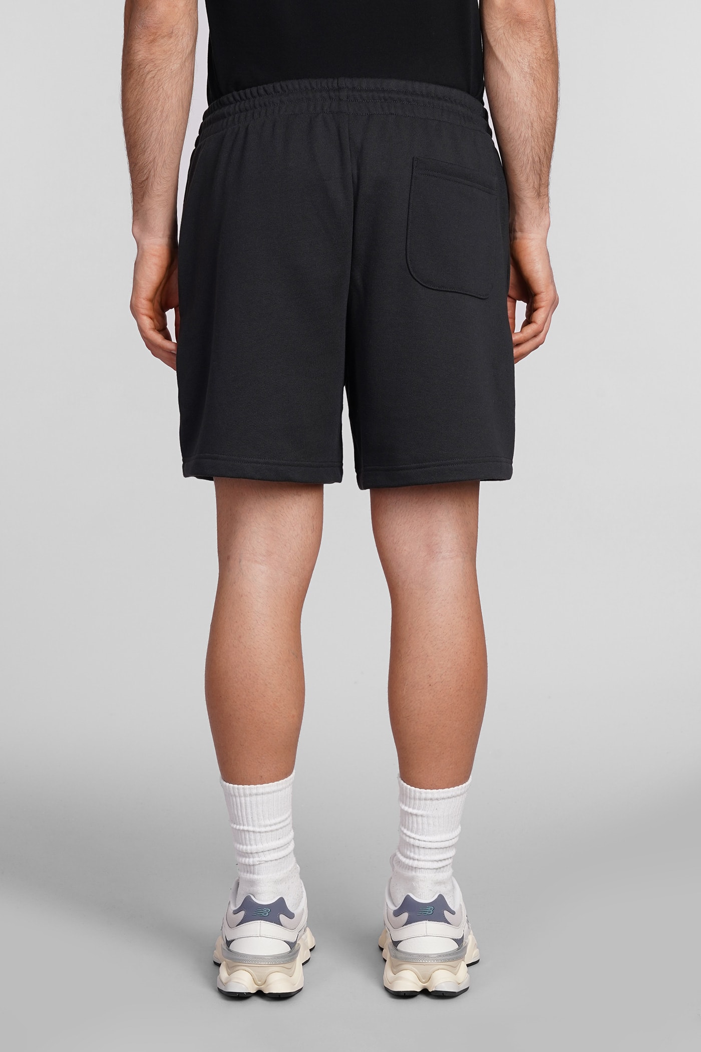 Shop New Balance Shorts In Black Cotton
