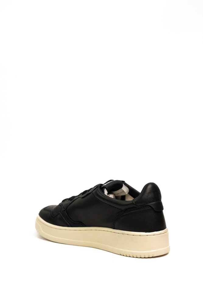 Shop Autry Medalist Low Sneakers In Black Goat Leather In Goat/goat Black