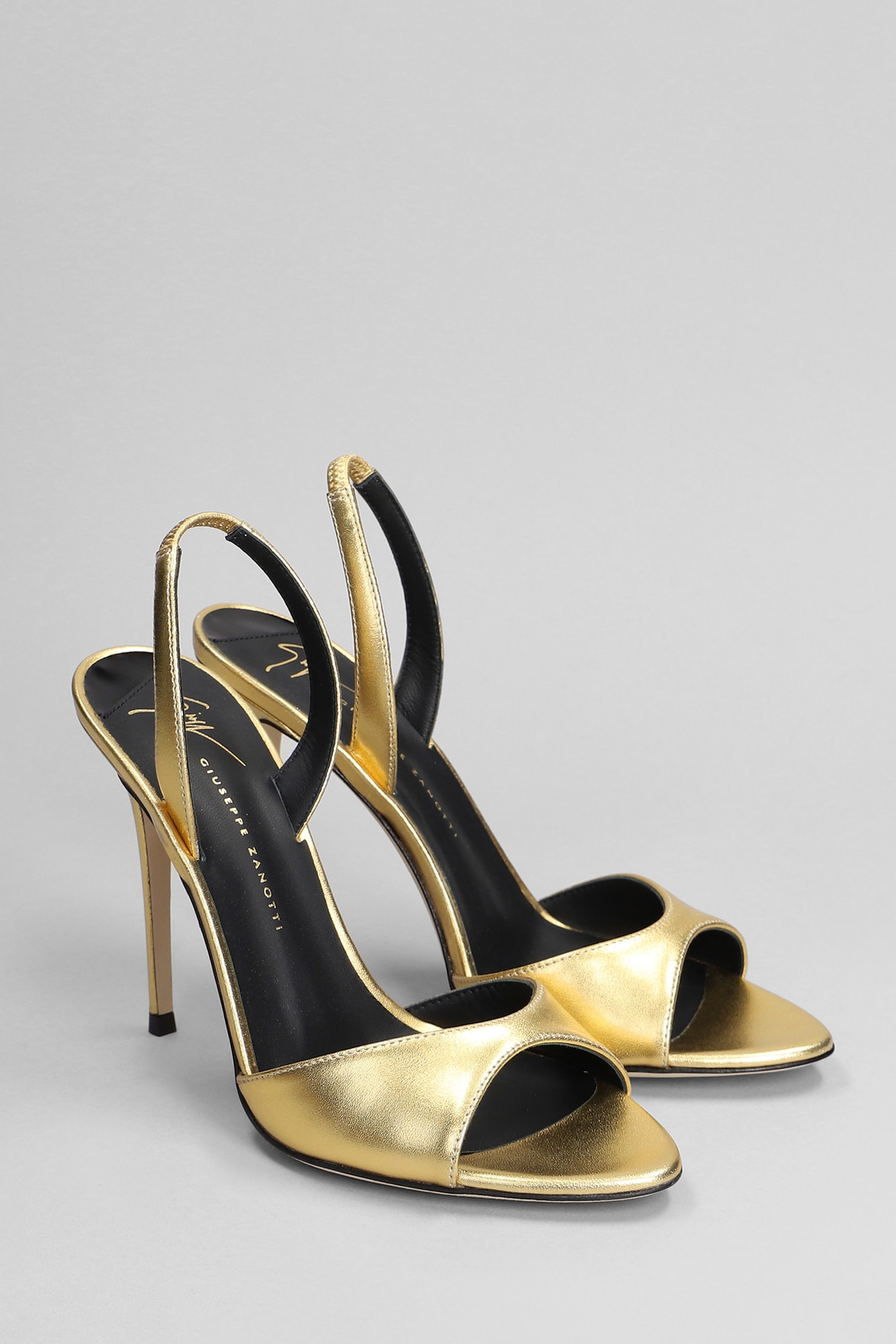 Shop Giuseppe Zanotti Sandals In Gold Leather