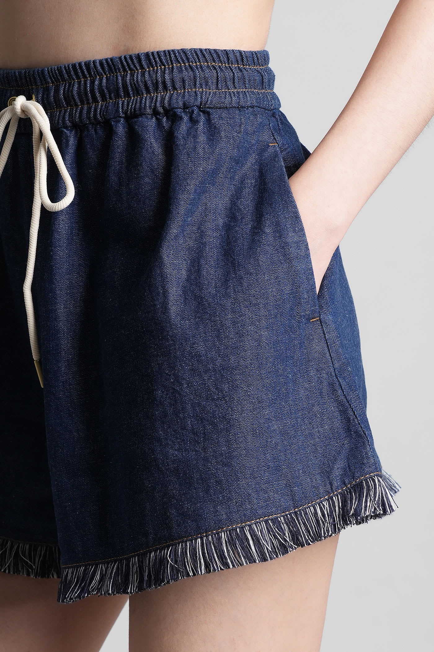 Zimmermann Rhiannon Drawstring Waist Fringe Hem Denim Shorts In Blue