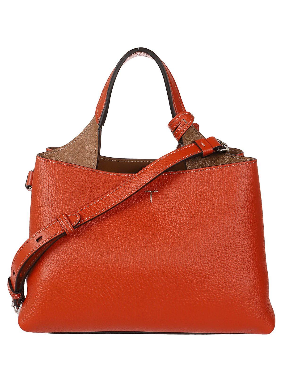 Shop Tod's Logo Embossed Mini Crossbody Bag In Arancio