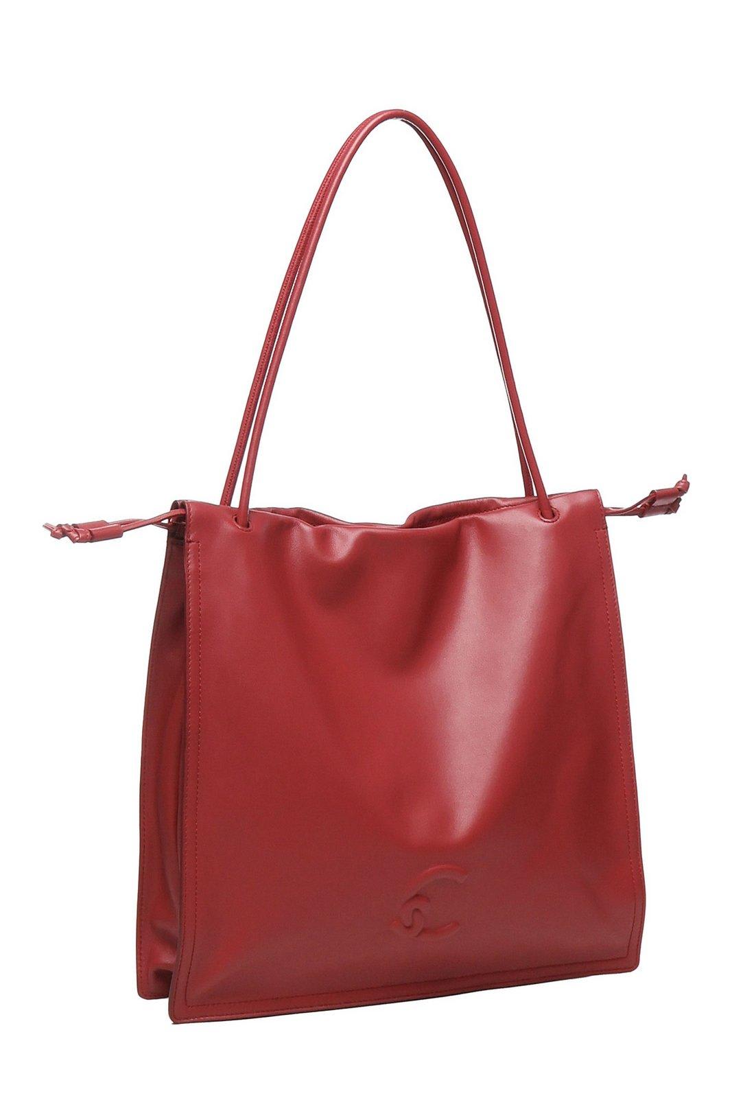 Coccinelle Logo Embossed Drawstring Tote Bag In Red