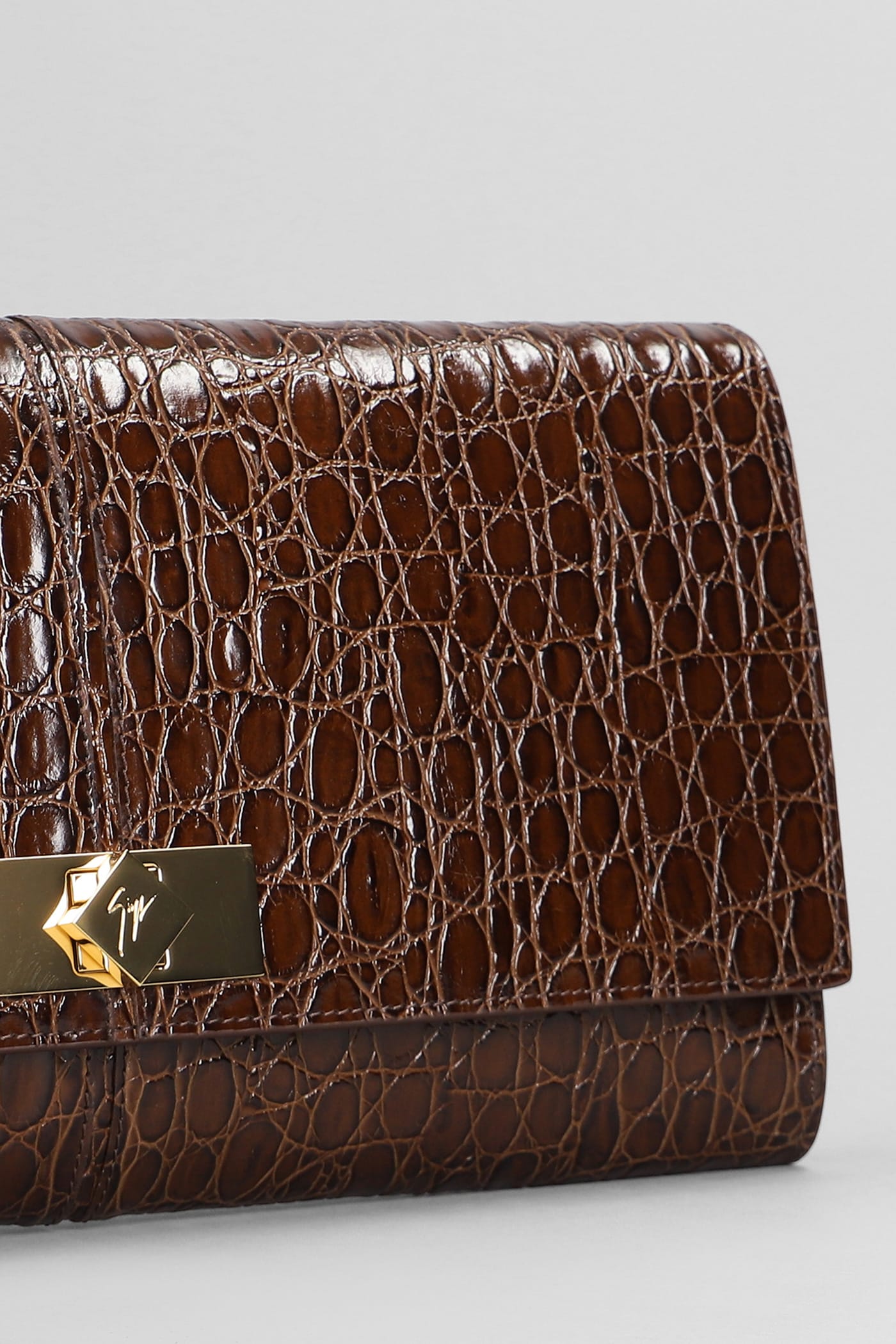 Shop Giuseppe Zanotti Montserrat Crocco Clutch In Brown Leather