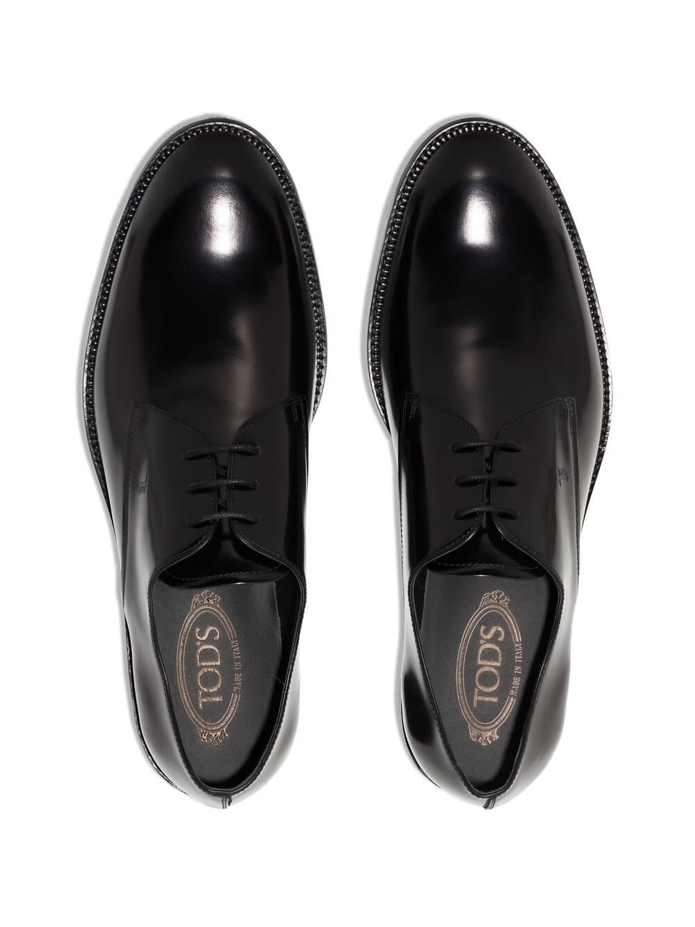 Shop Tod's Derbies In Black