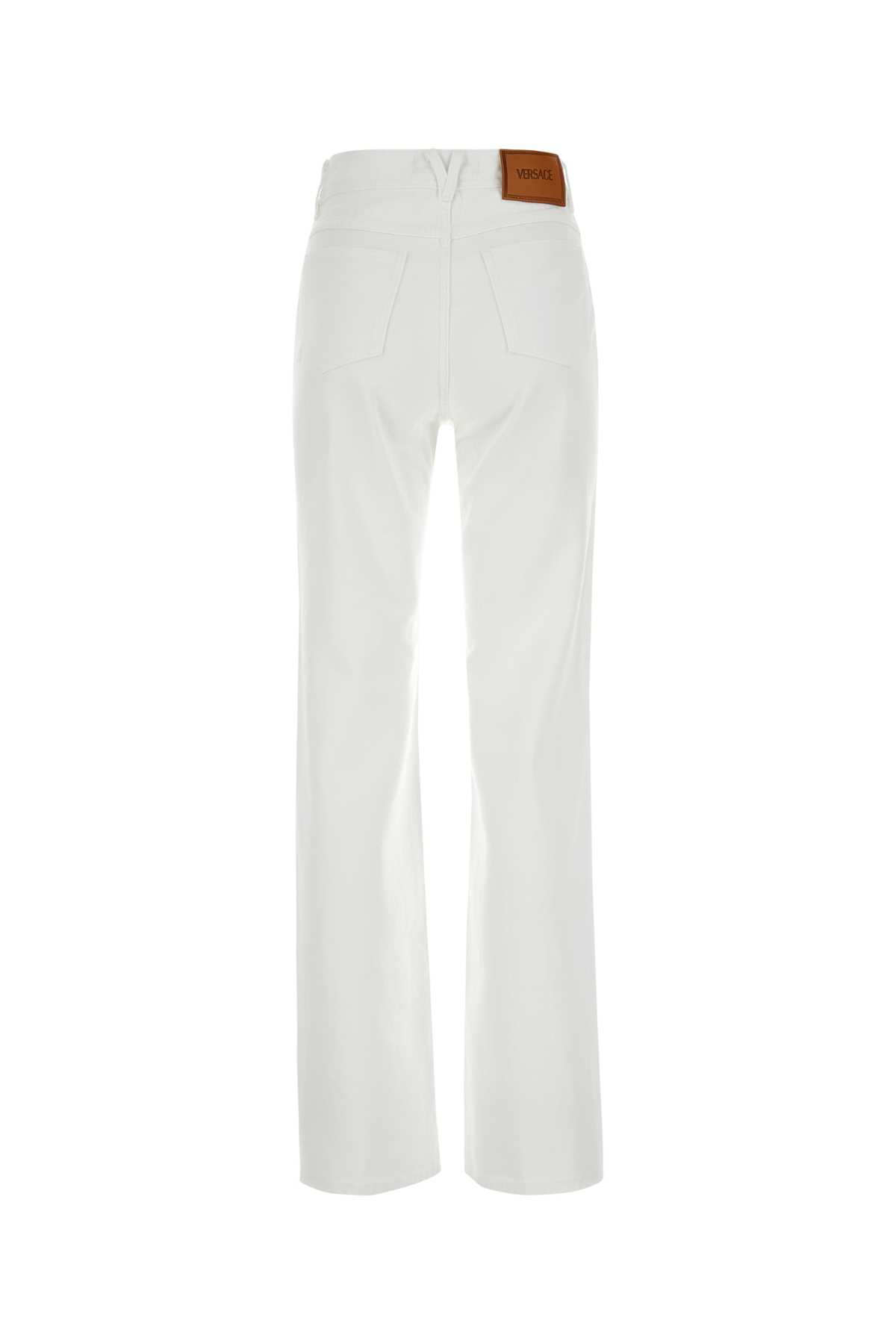 Shop Versace White Denim Jeans In 1d110white