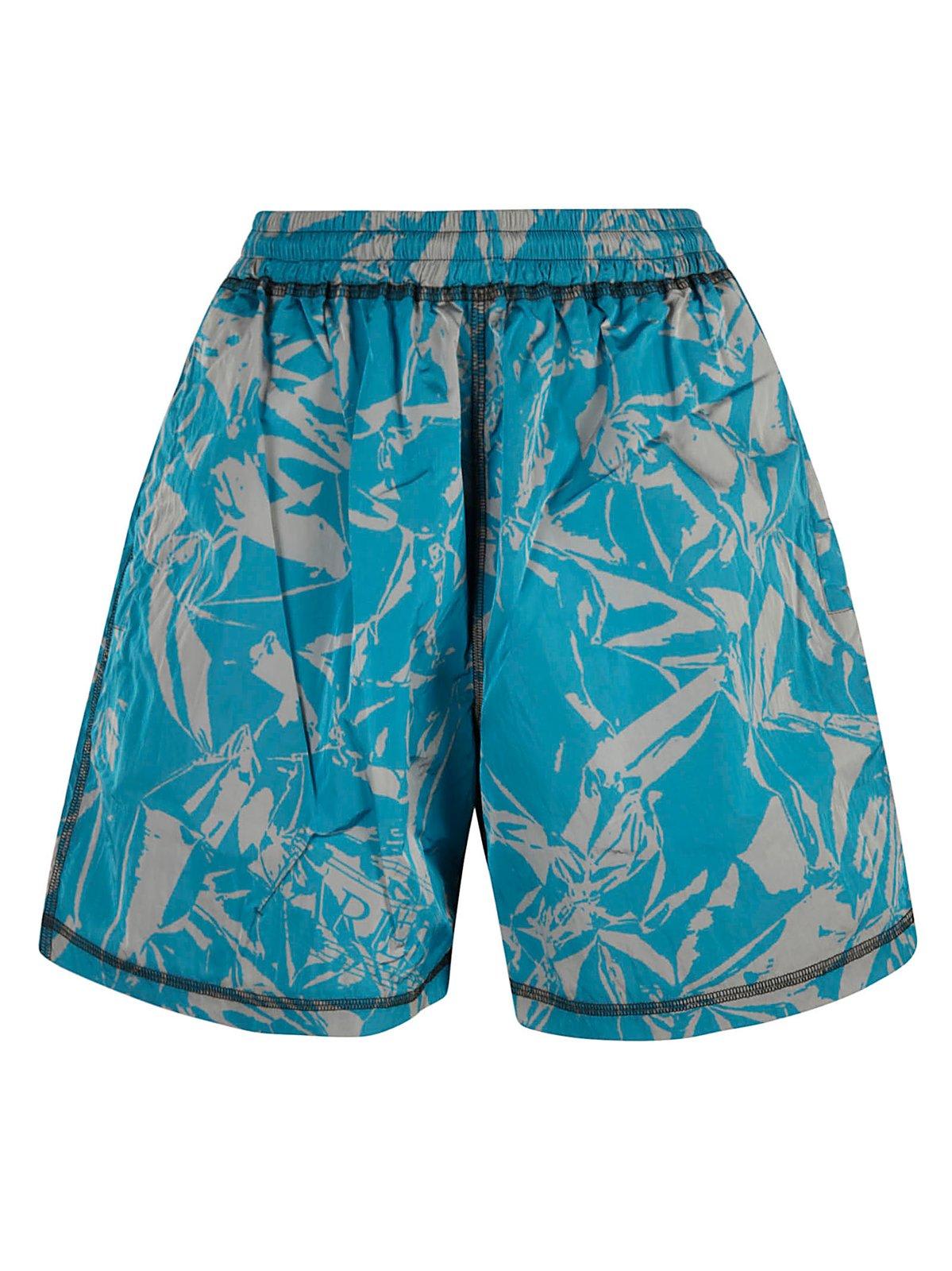 Shop Aries Abstract Pattern Logo Patch Shorts In Blue