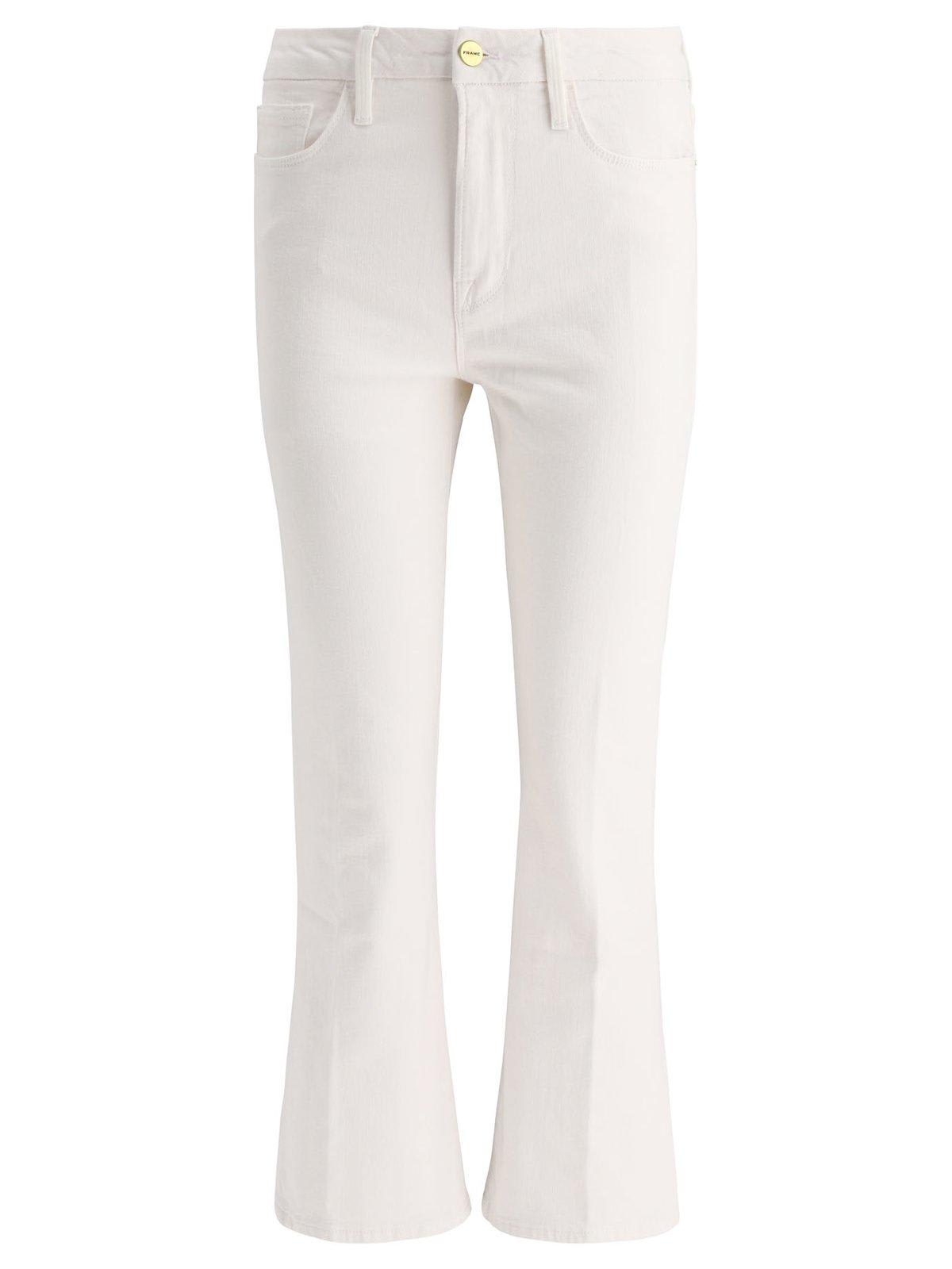 Shop Frame Low-rise Flared Jeans In White