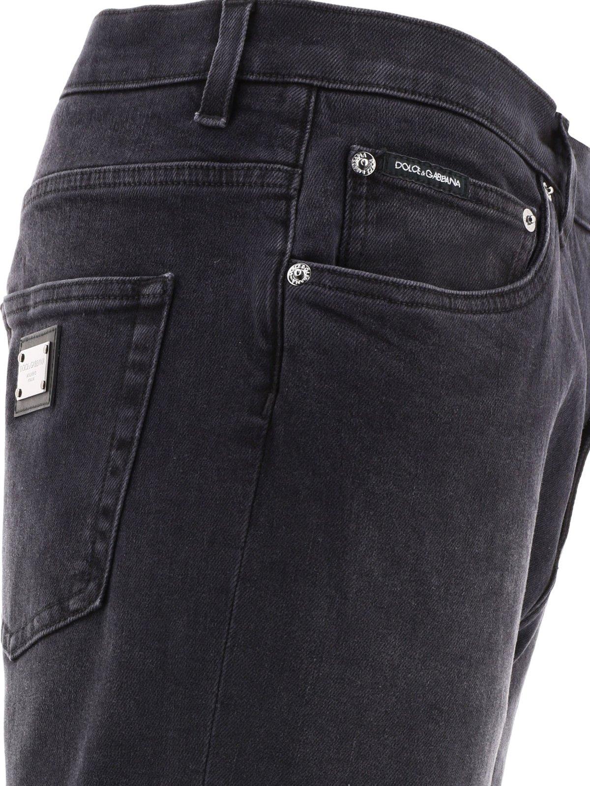 Dolce & Gabbana Logo Plaque Tapered Leg Jeans In Blue
