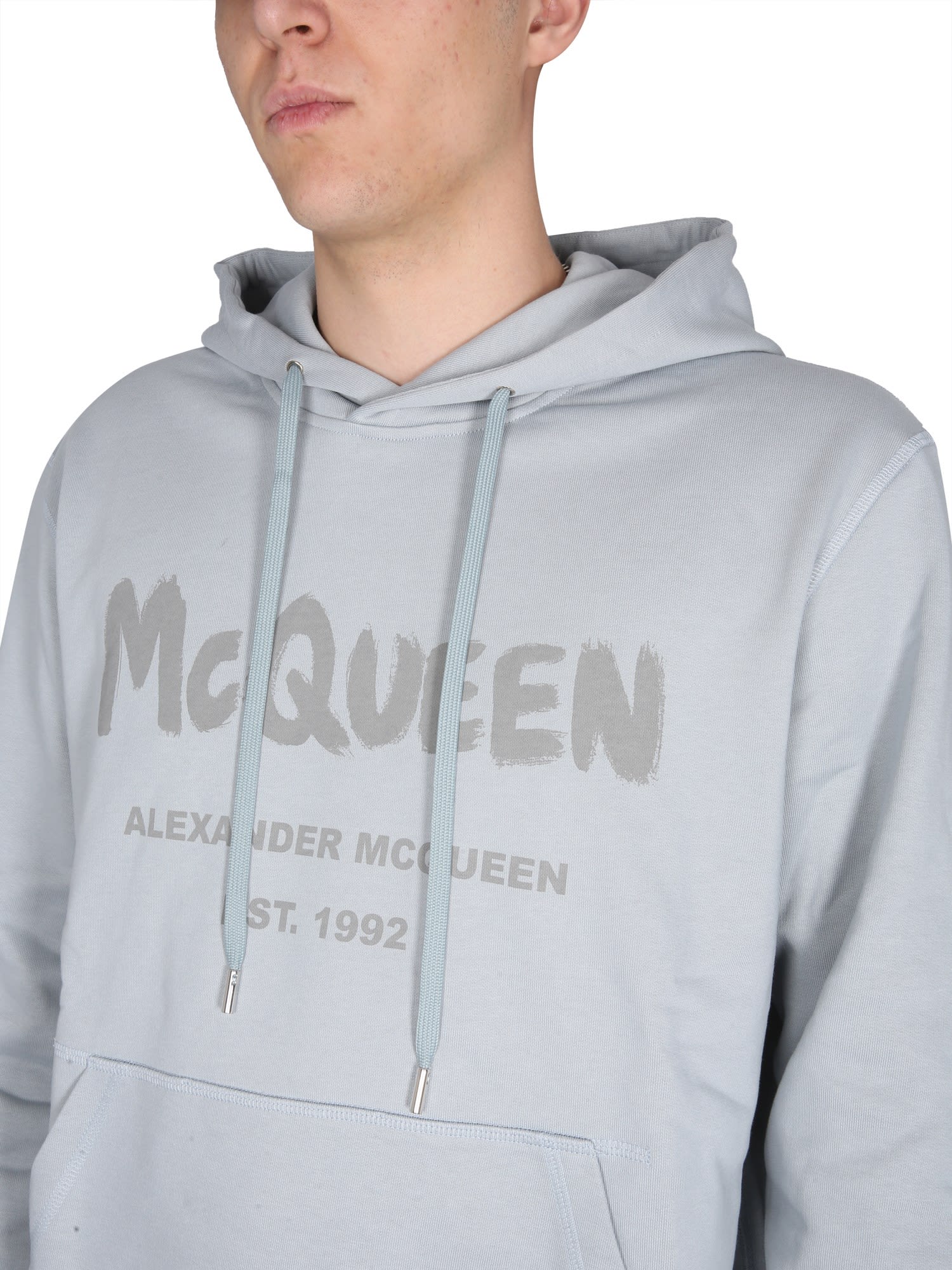 ALEXANDER MCQUEEN GRAFFITI LOGO PRINT SWEATSHIRT