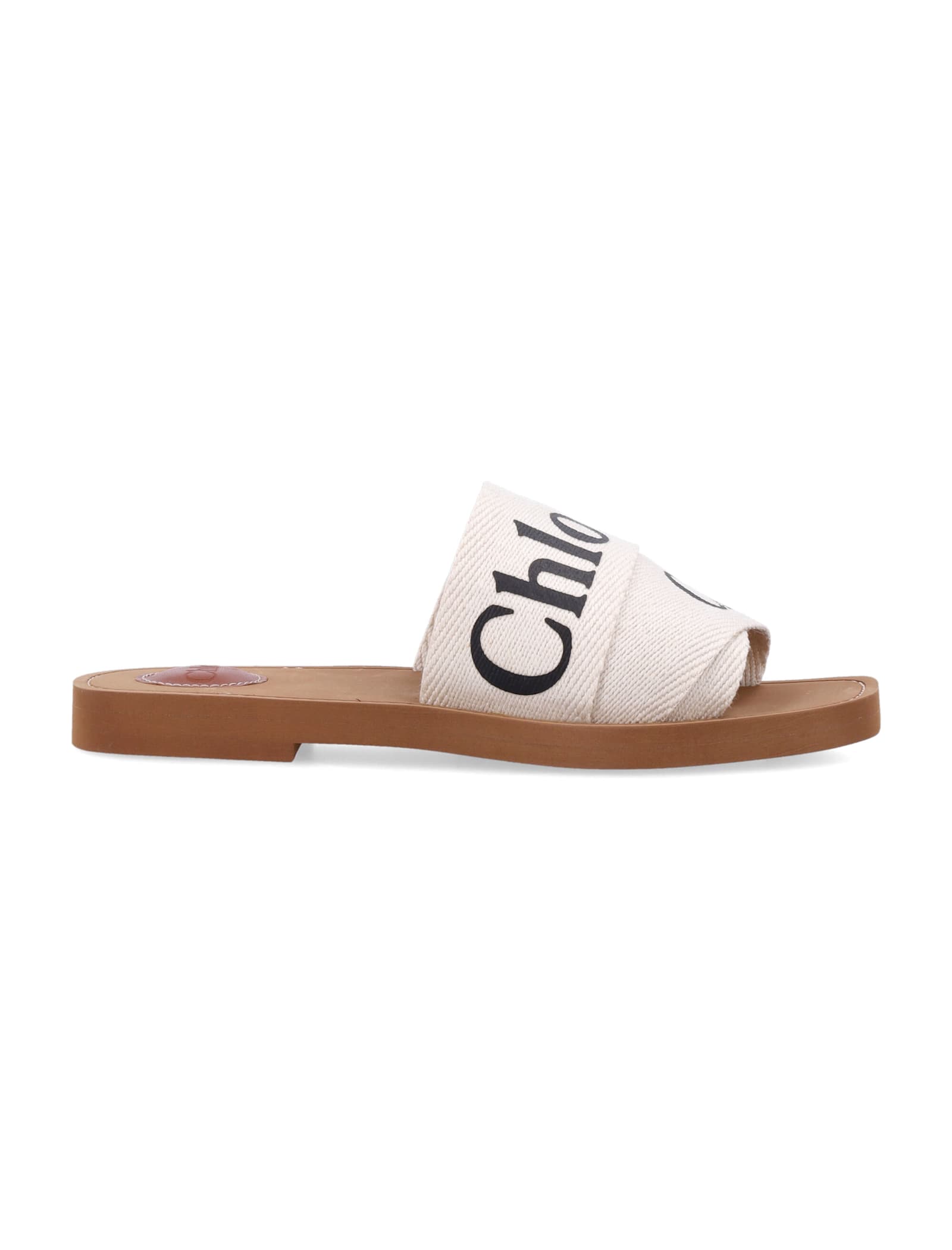 Shop Chloé Woody Slides Sandals In White