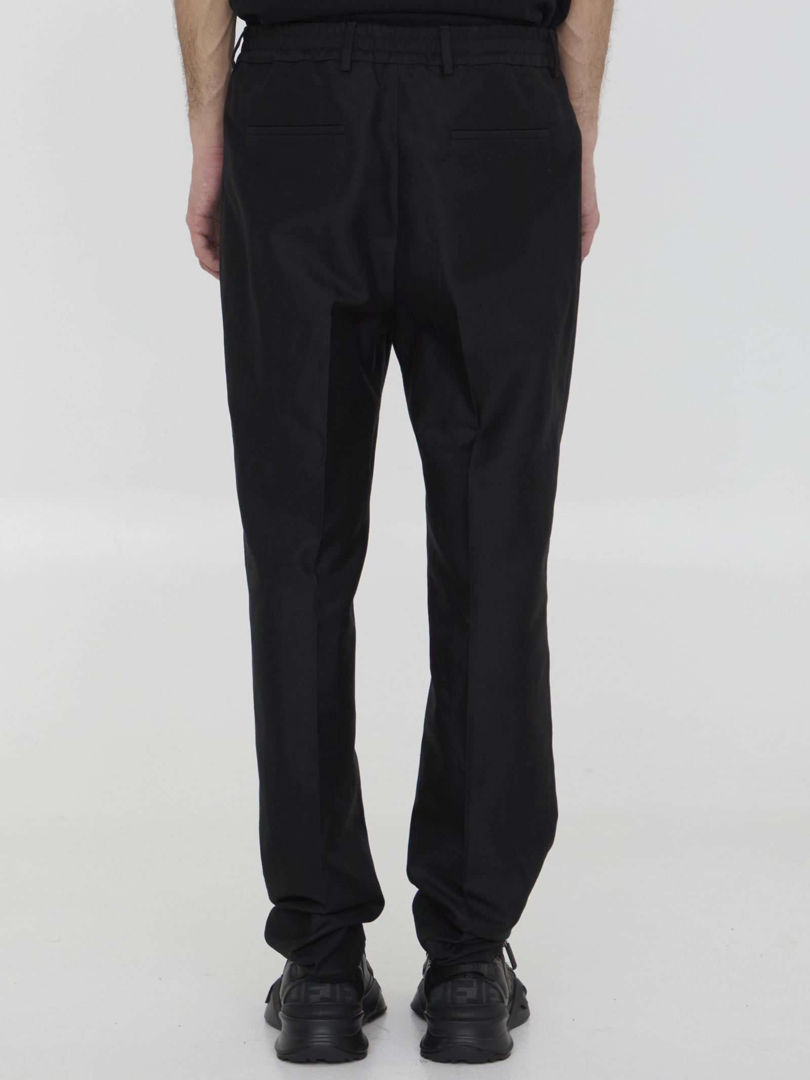 Shop Fendi Pleated Trousers In Black